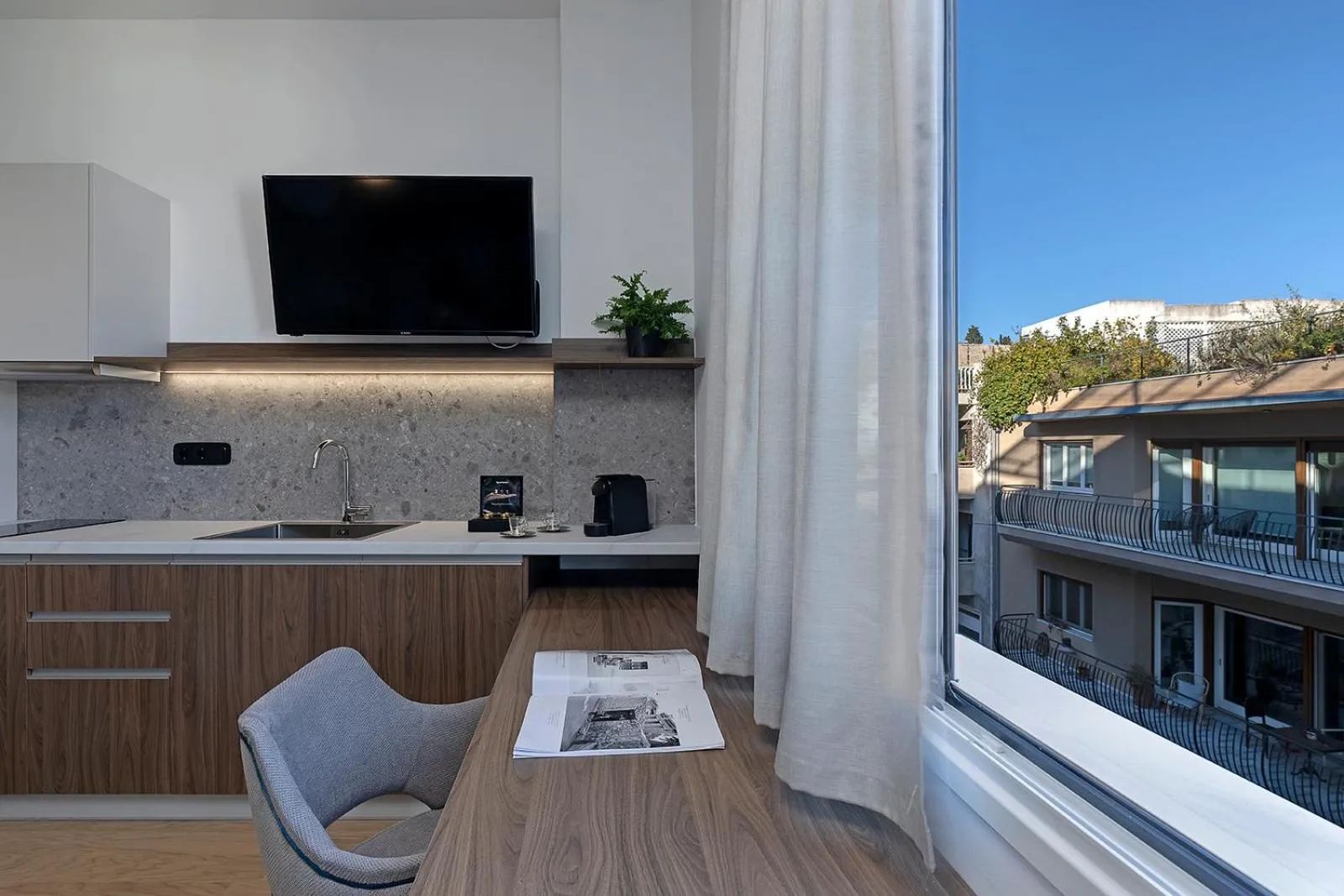 Kitchen or kitchenette in Acro Urban Suites