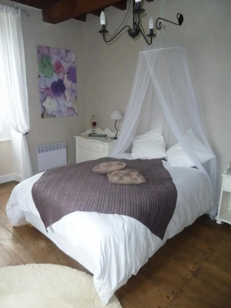 Bed in A L'Ombre Du Marronnier GITES