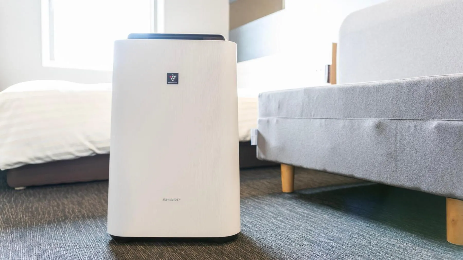 Bed in Super Hotel Kanku Kumatoriekimae