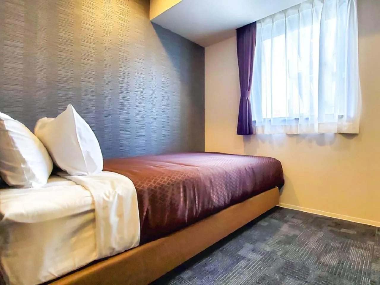 Bed in HOTEL LiVEMAX Tachikawa Ekimae
