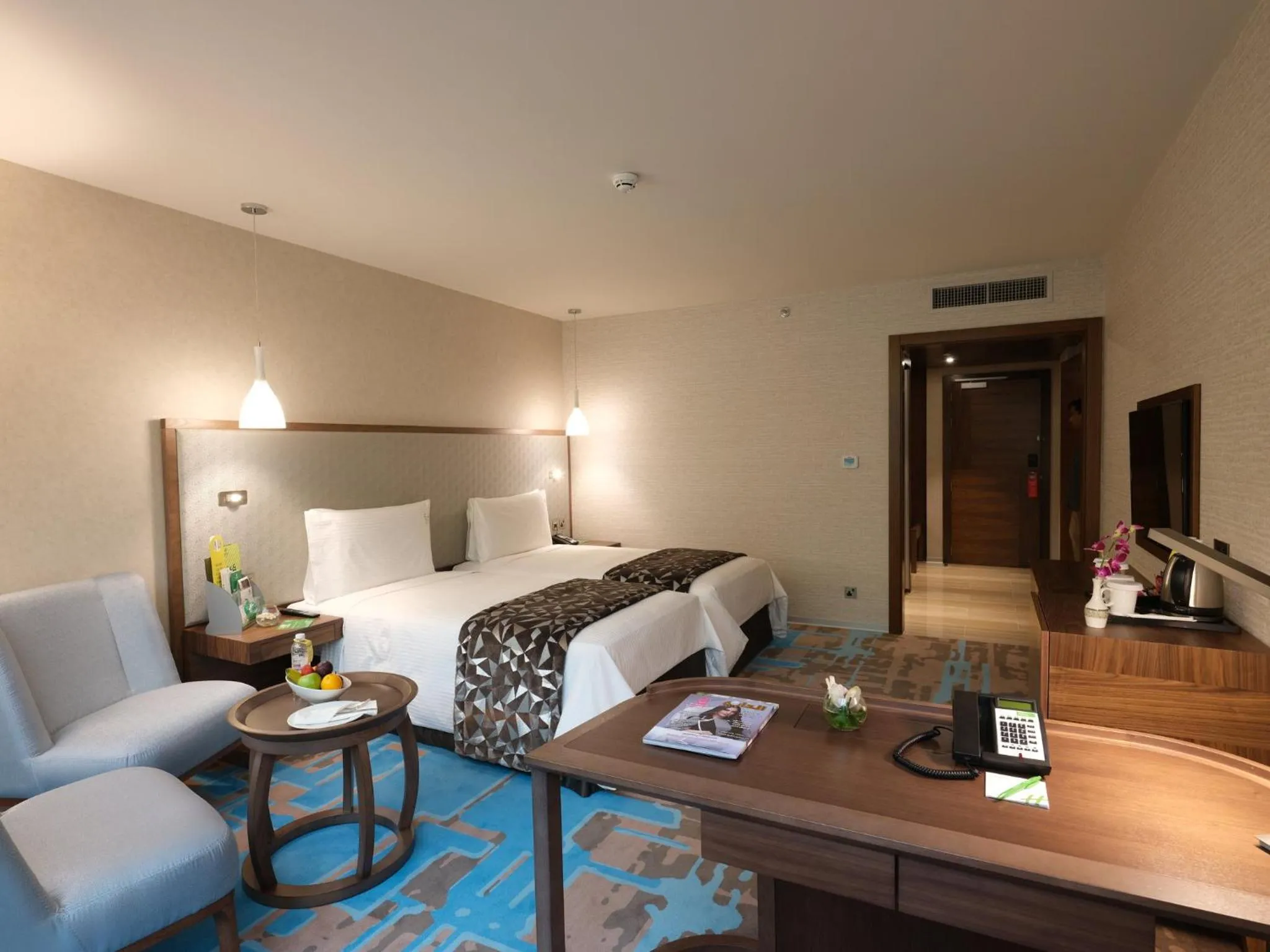 Photo of the whole room, Bed in Holiday Inn Kuwait Al Thuraya City by IHG