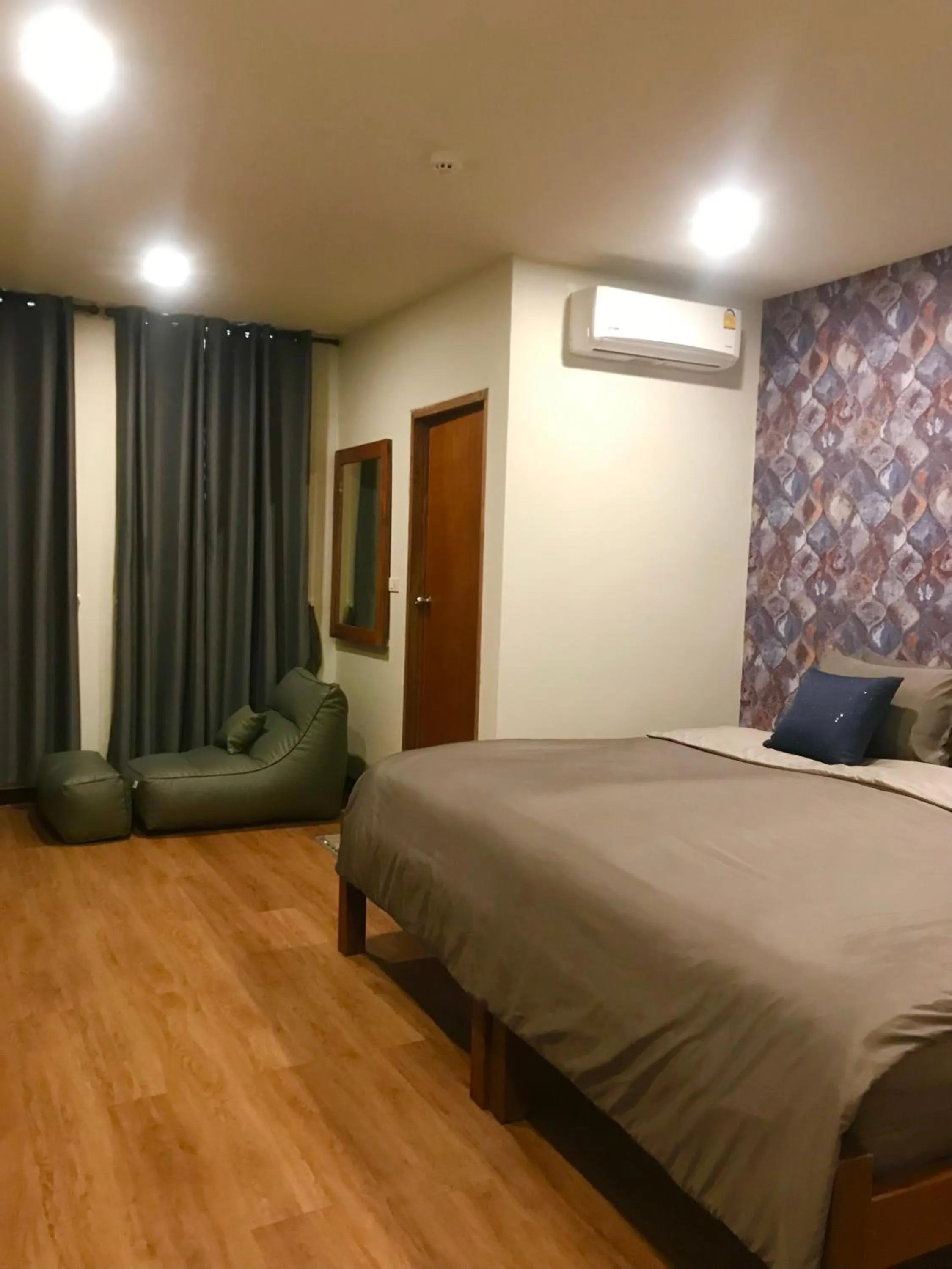 Bed in Chern Chiangmai Boutique Hotel