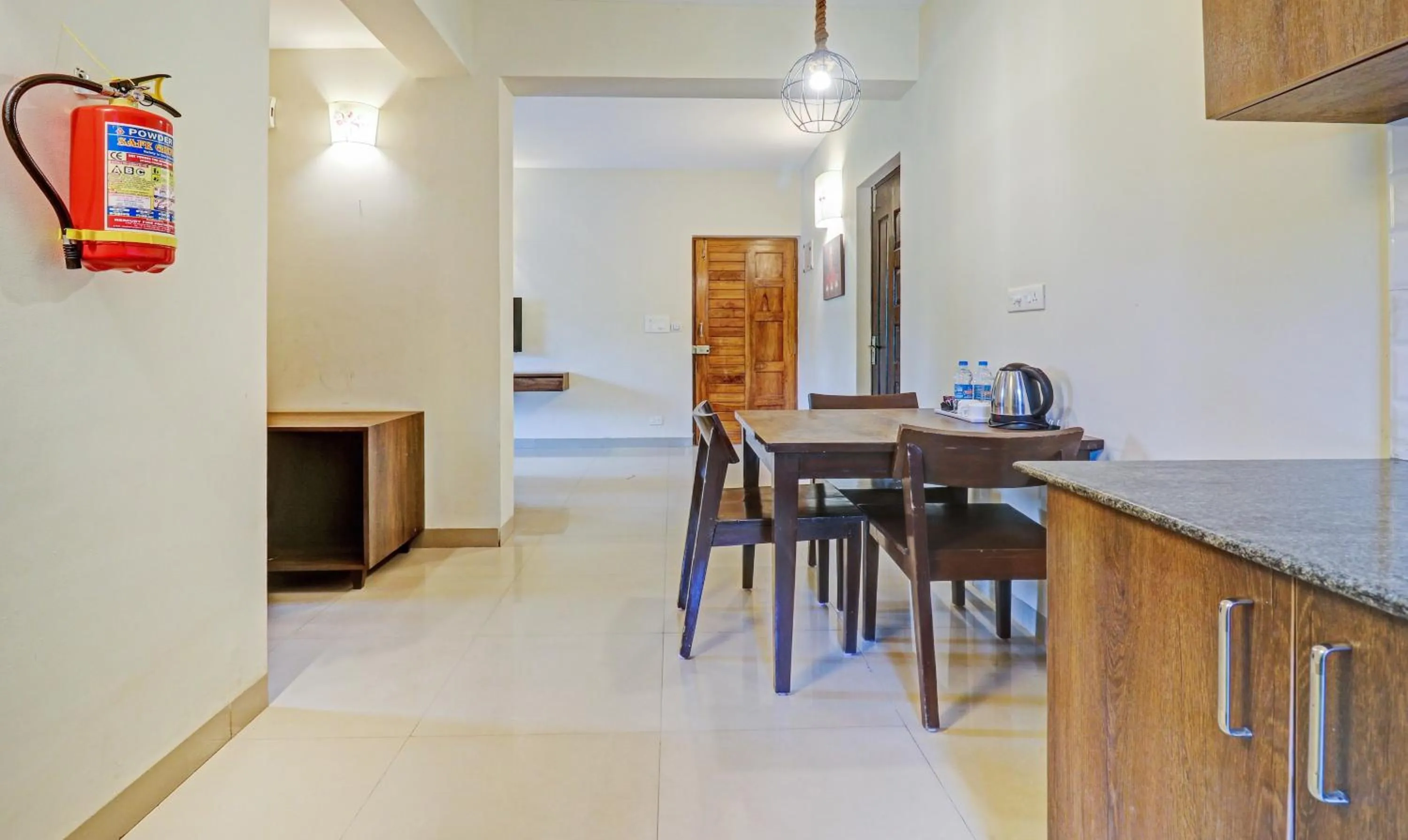 Kitchen or kitchenette in Treebo Aquamarine Arpora With Pool