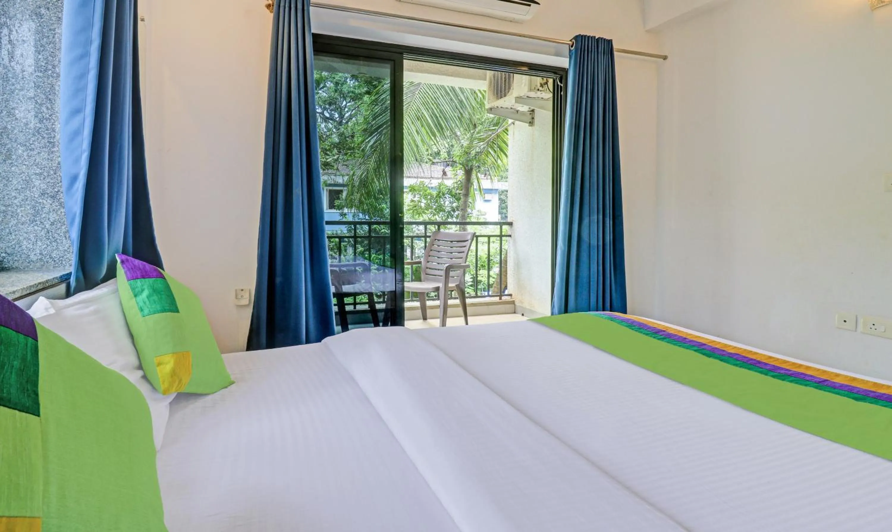 Bedroom, Bed in Treebo Aquamarine Arpora With Pool