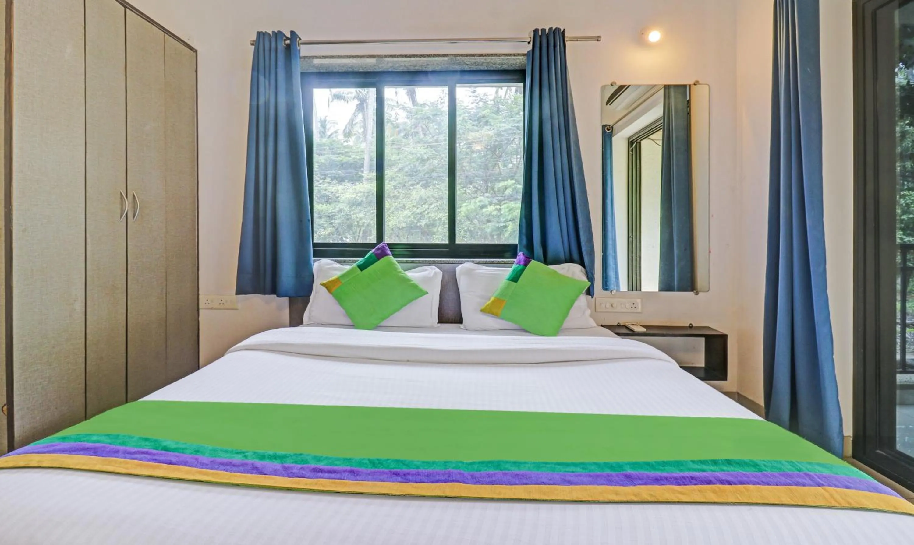 Bedroom, Bed in Treebo Aquamarine Arpora With Pool