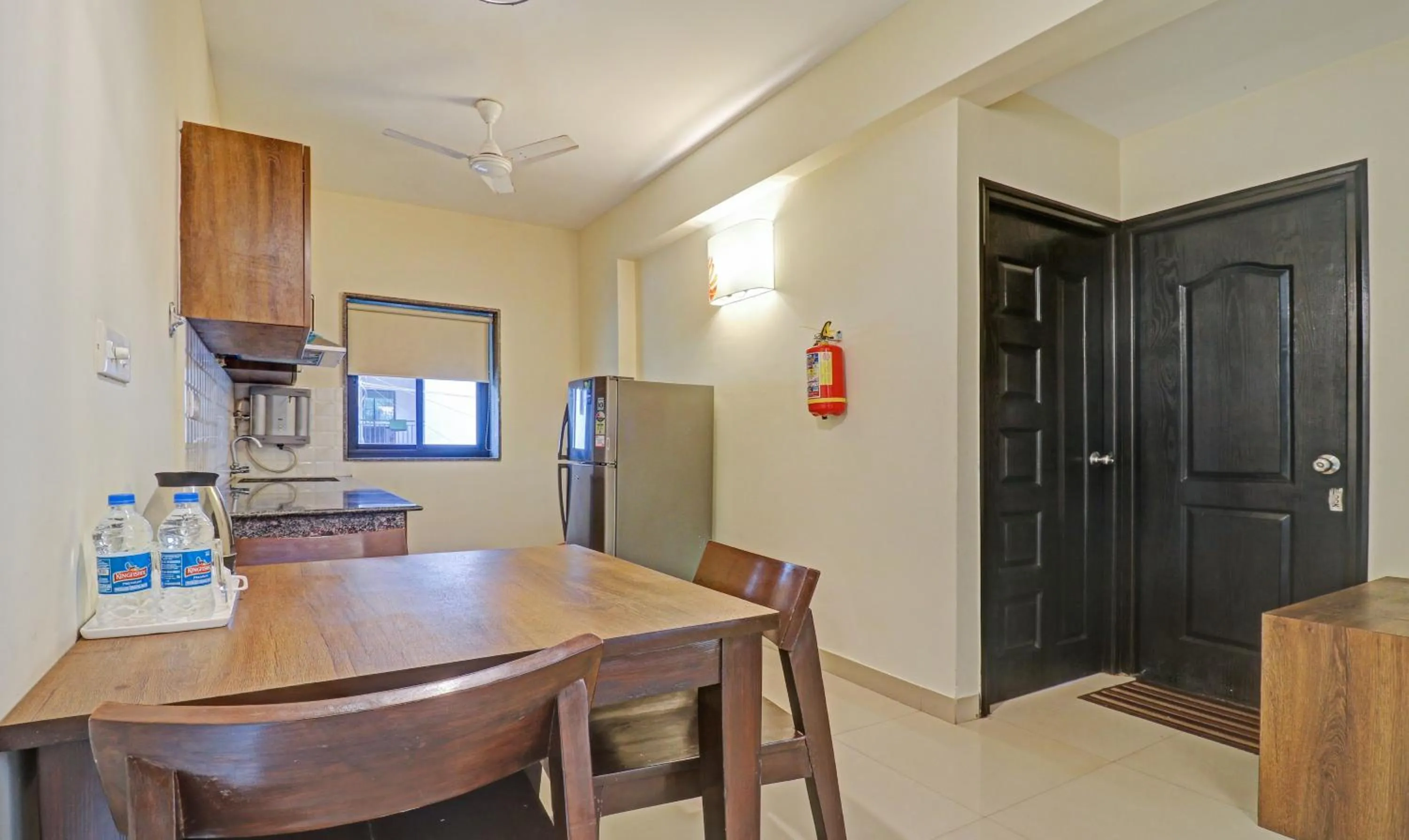 Kitchen or kitchenette in Treebo Aquamarine Arpora With Pool