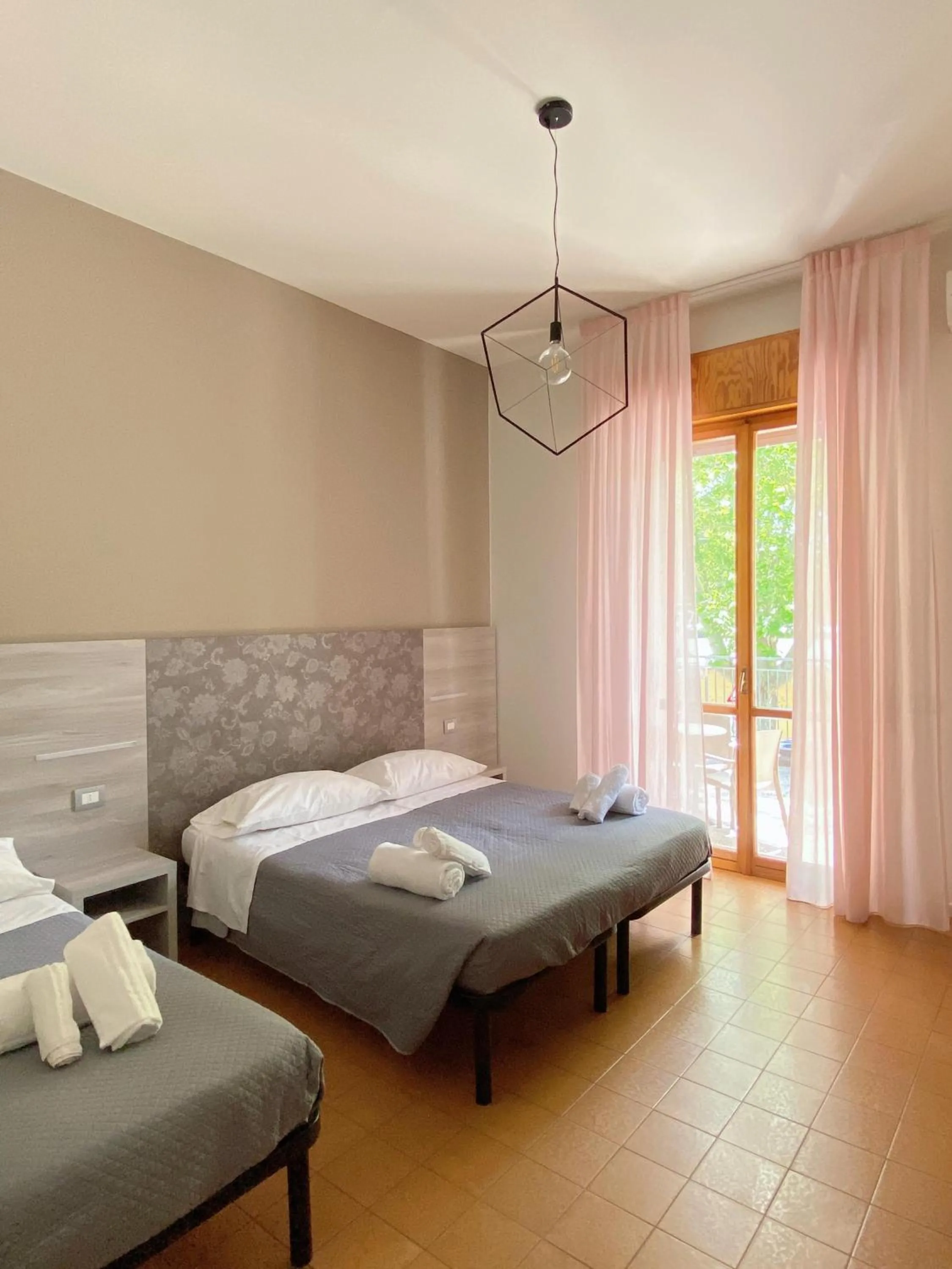 Bedroom in Hotel Residence Ponente