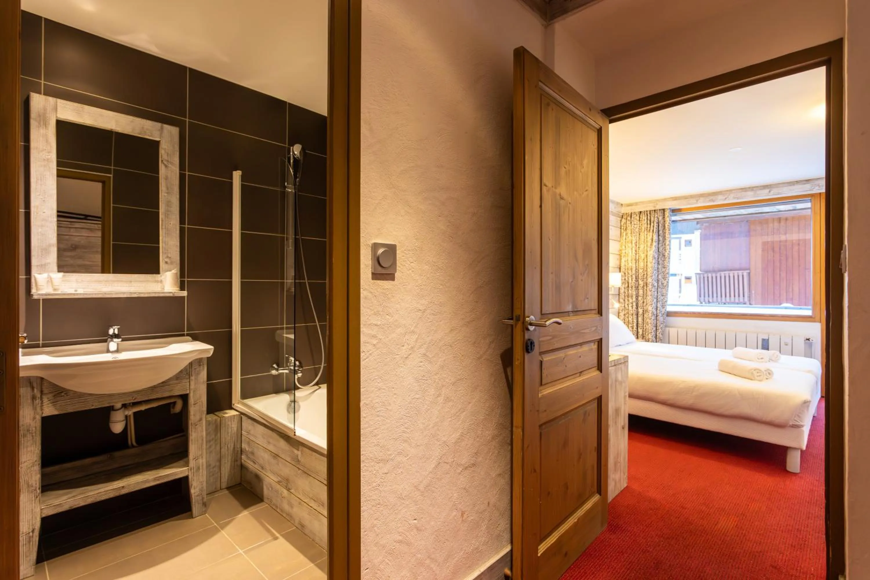 Bed in Hôtel L'Aiguille Percée