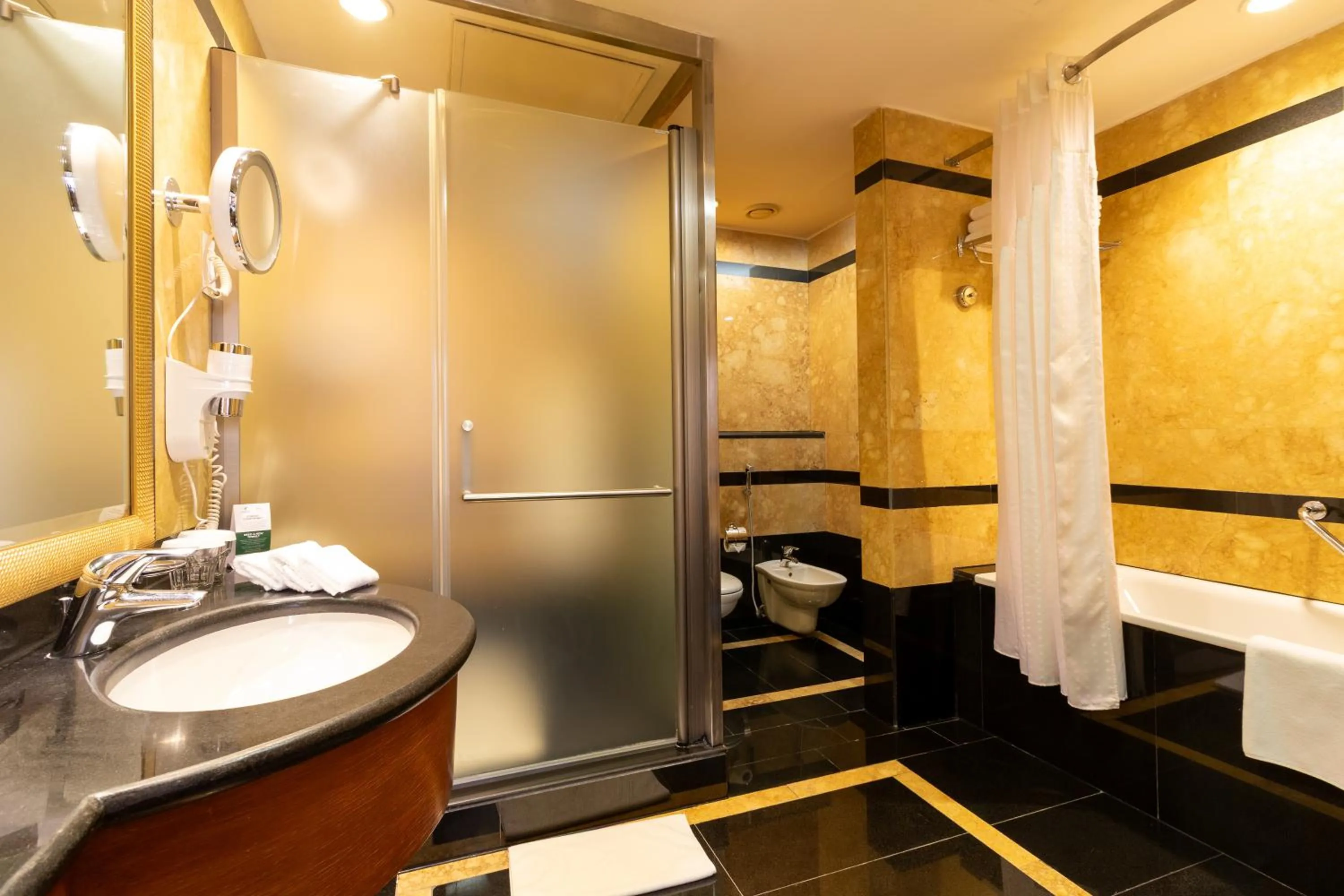 Bathroom in Holiday Inn Kuwait by IHG