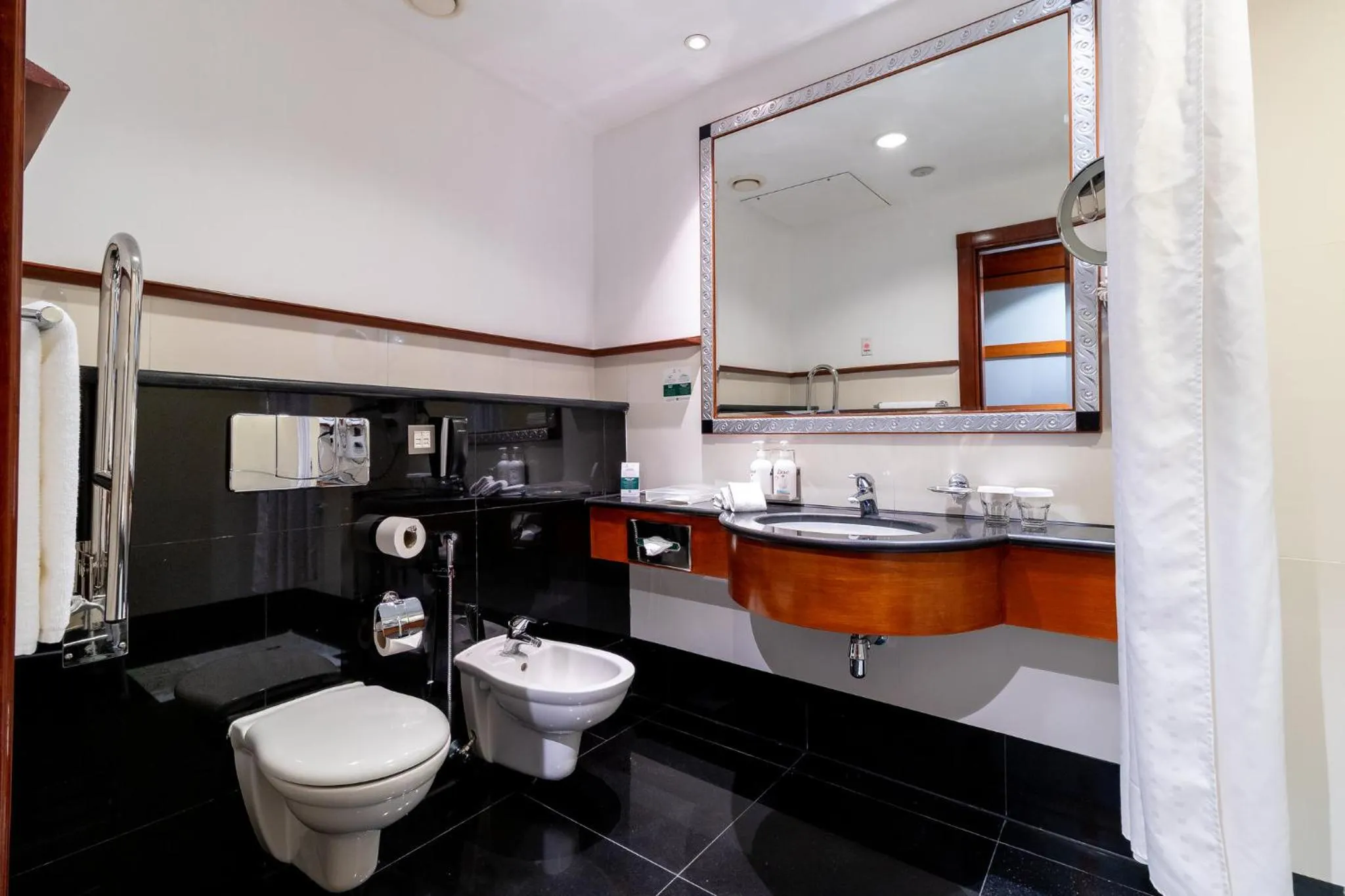 Bathroom in Holiday Inn Kuwait by IHG