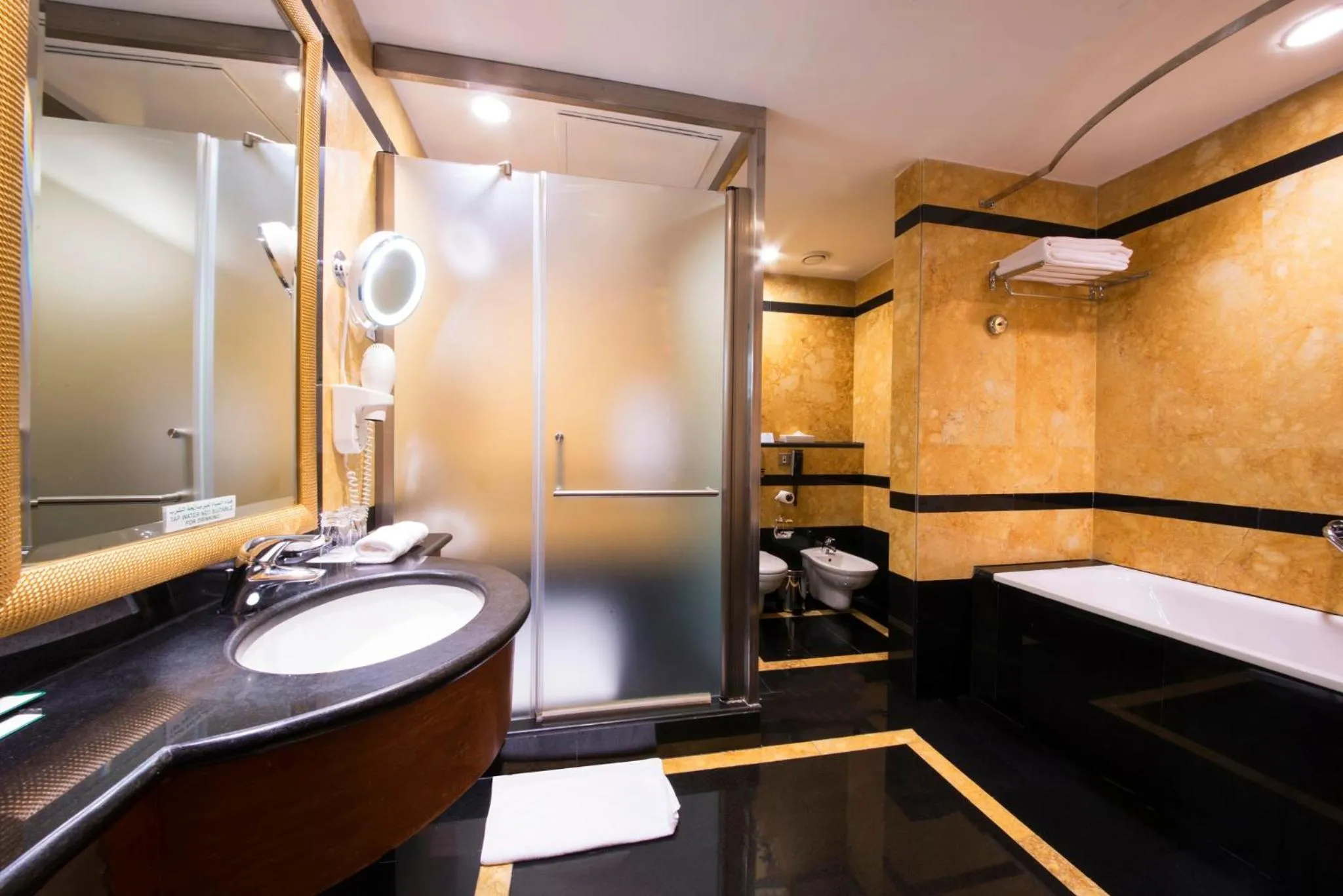 Bathroom in Holiday Inn Kuwait by IHG