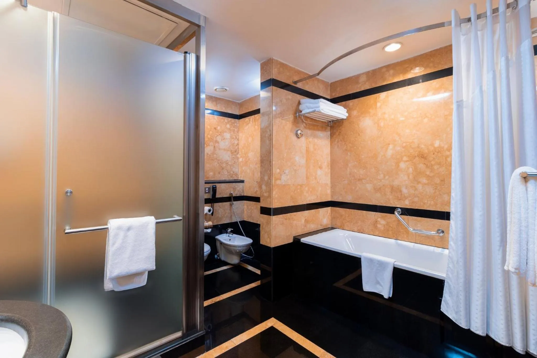 Bathroom in Holiday Inn Kuwait by IHG