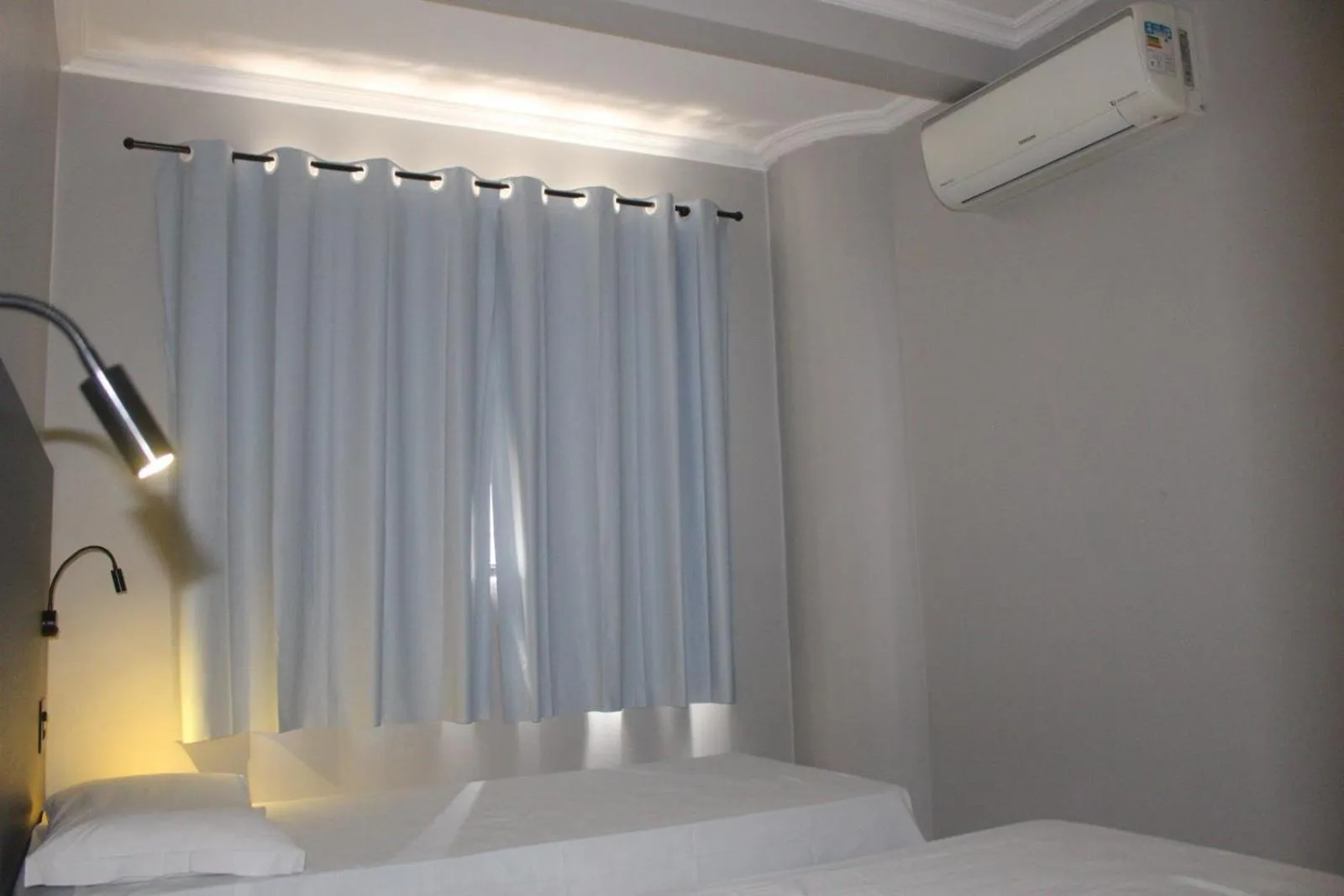 air conditioner, Bed in Hotel Di Sica