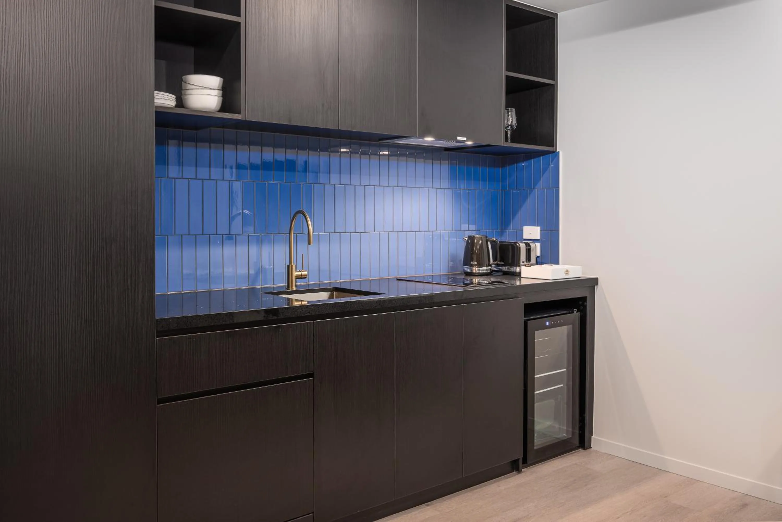 Kitchen or kitchenette in Oros Hotel and Apartments