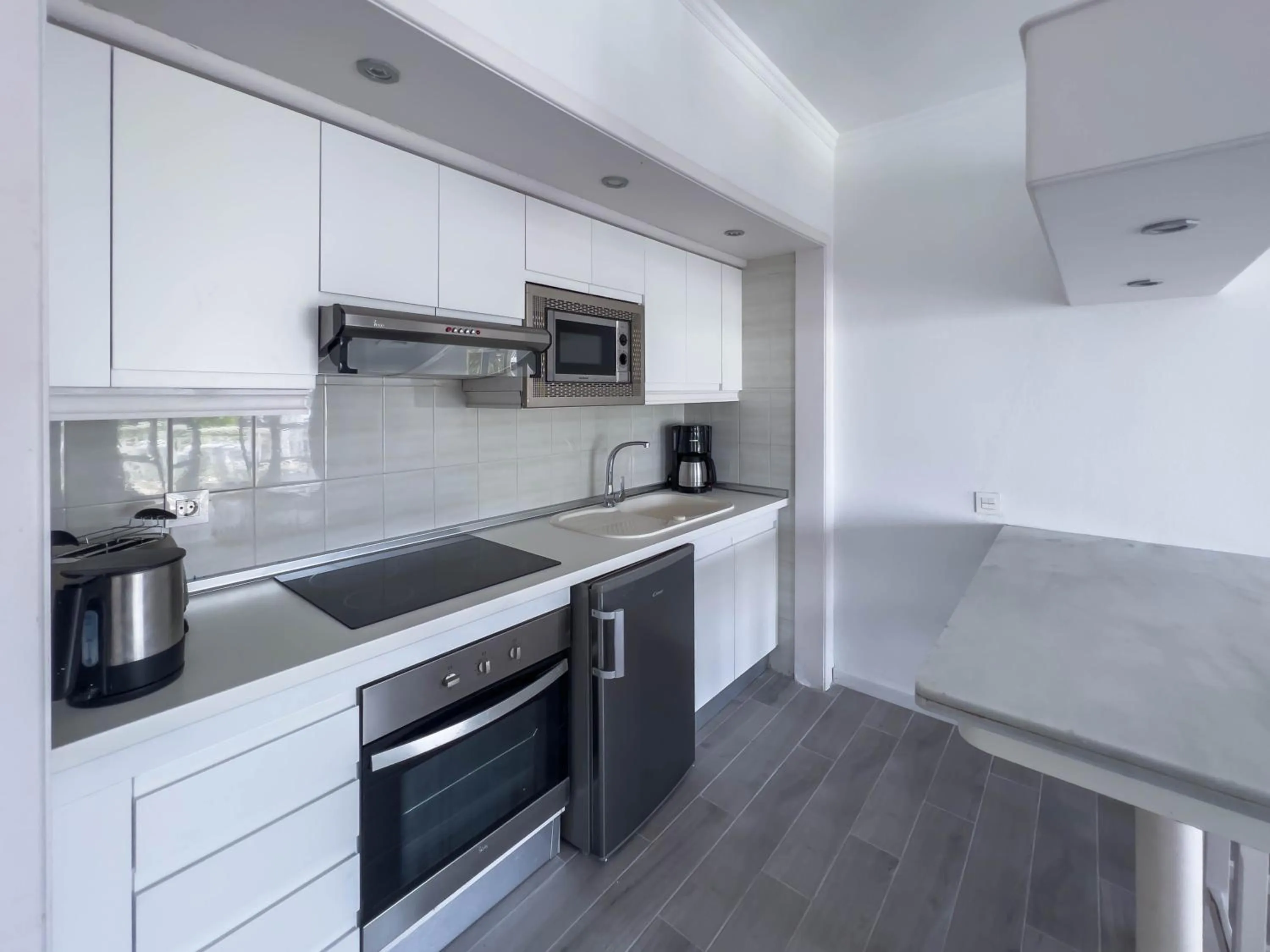 kitchen in Apartamentos Parque del Sol