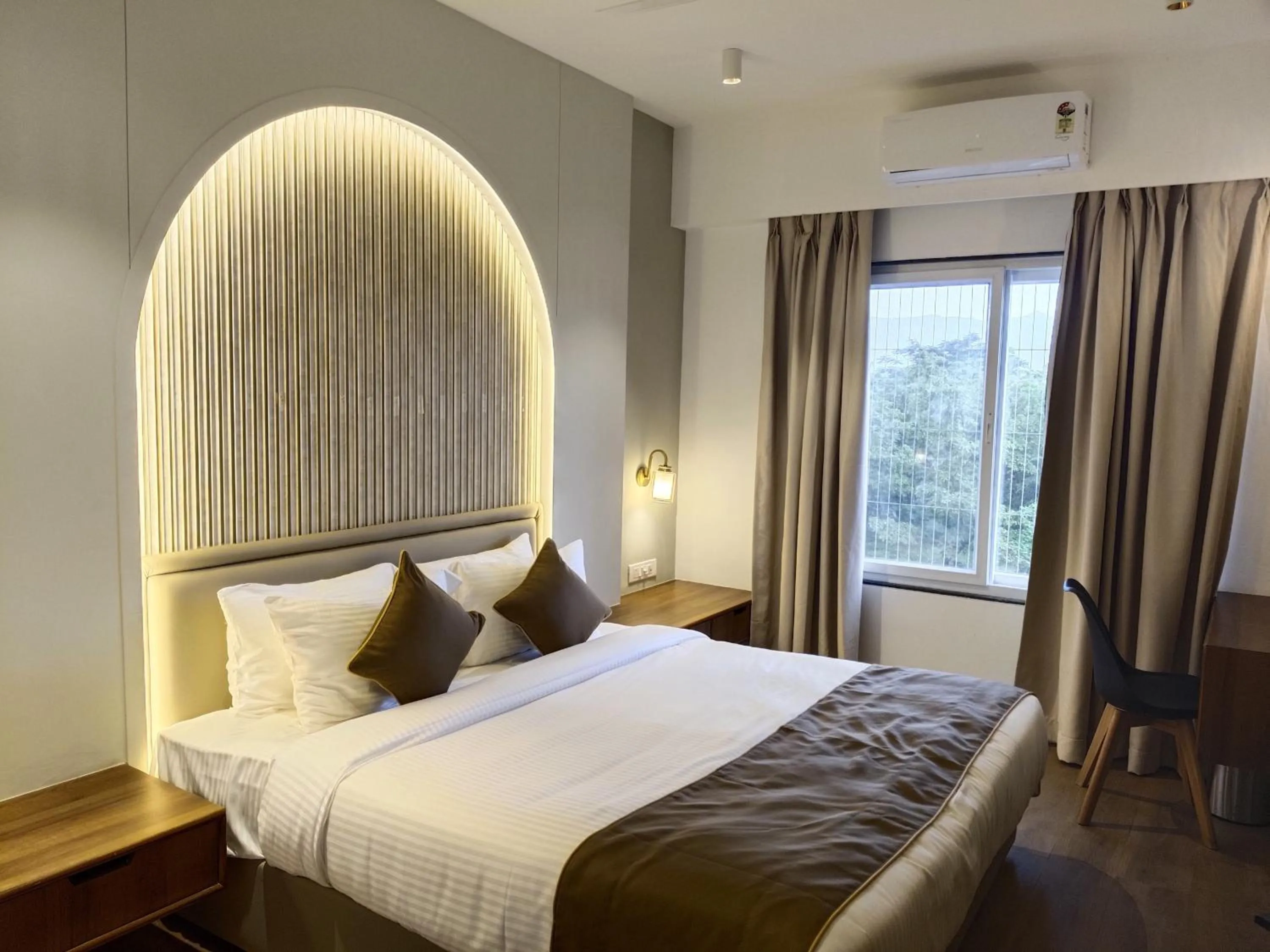 Bed in Pushpam Sanskruti Resort Karjat