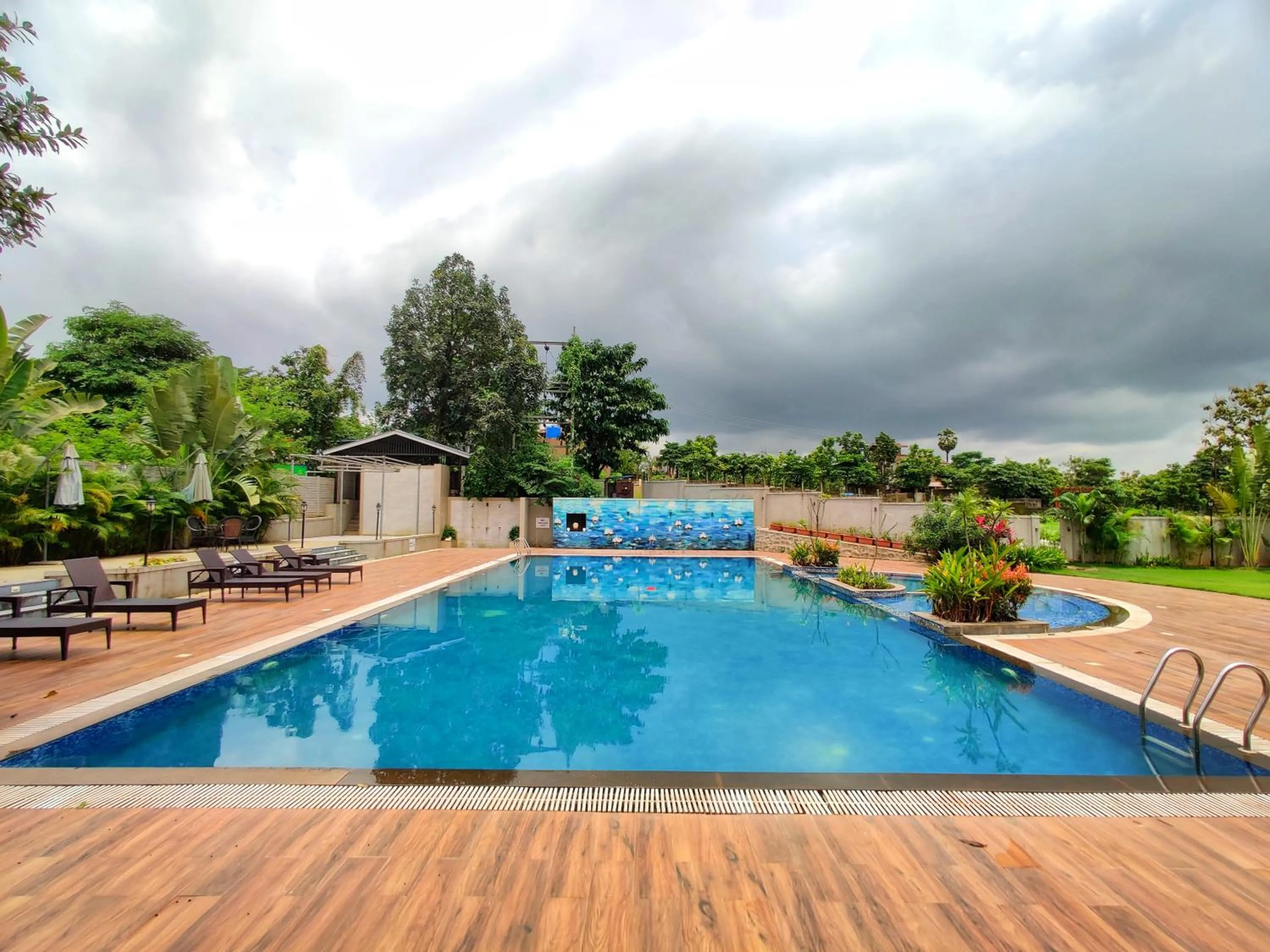 Swimming pool in Pushpam Sanskruti Resort Karjat