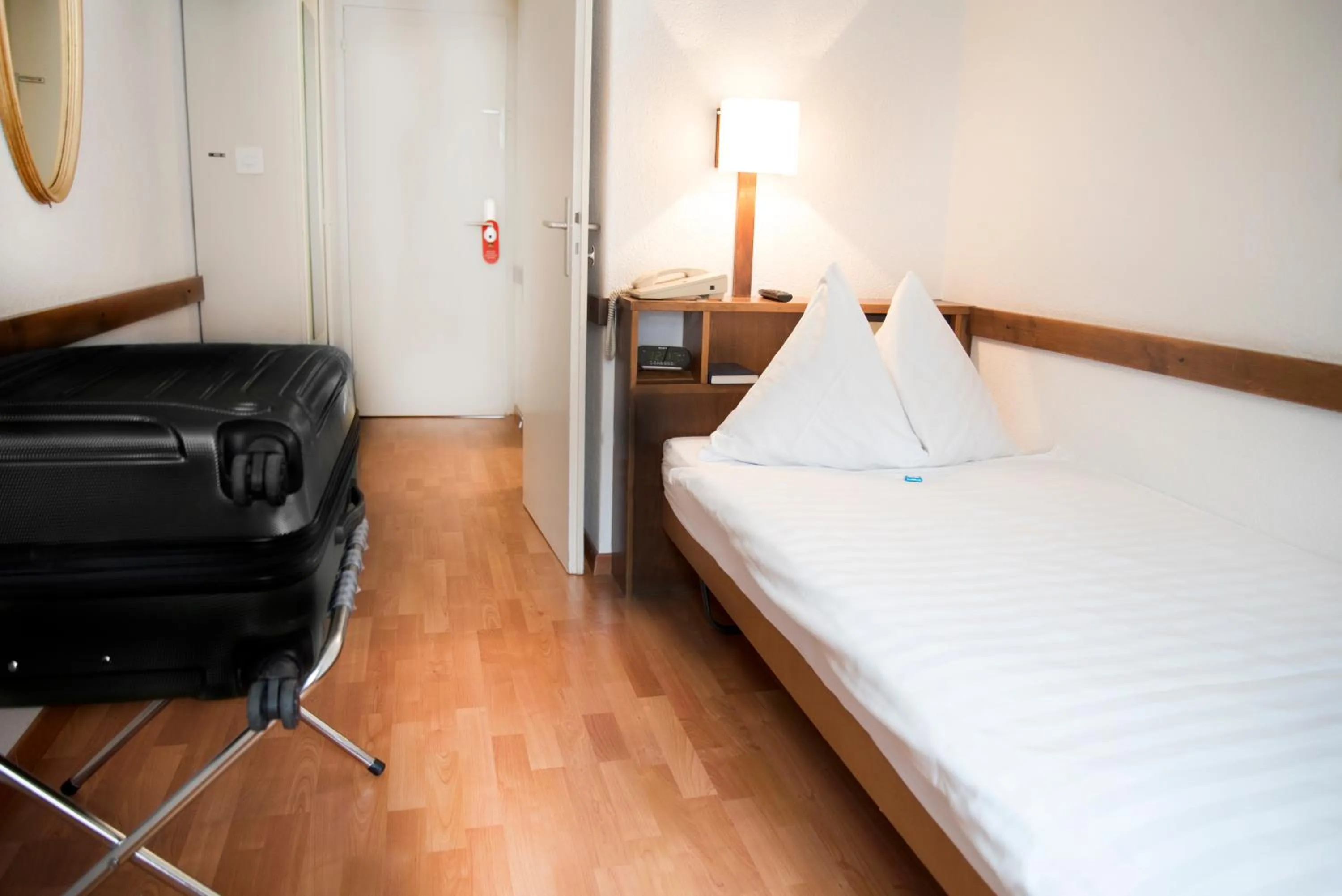 Bed in Hotel Rothaus Luzern & Peruvian Culinary Art