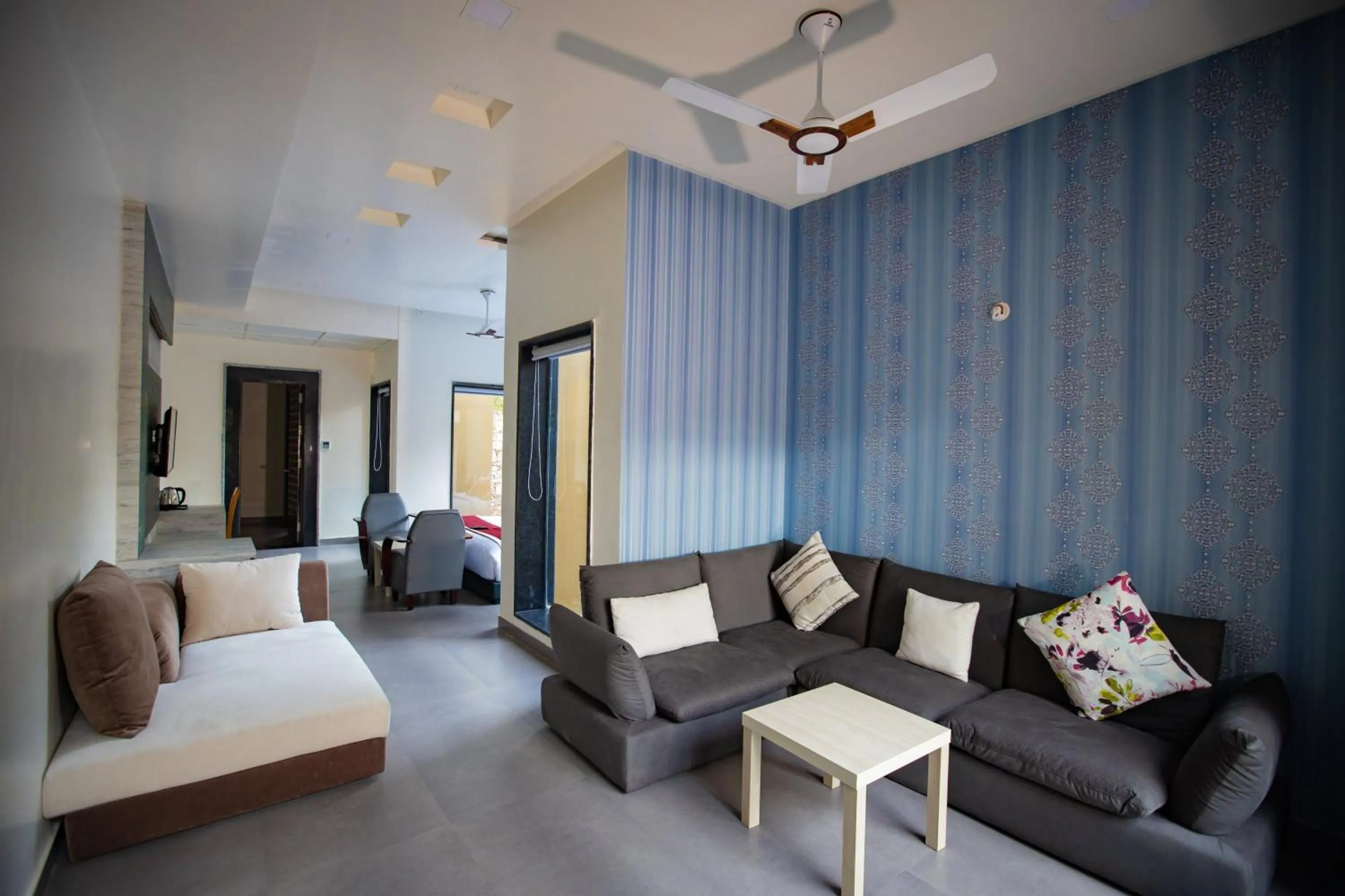 Seating area, Bed in Nature Village Resort