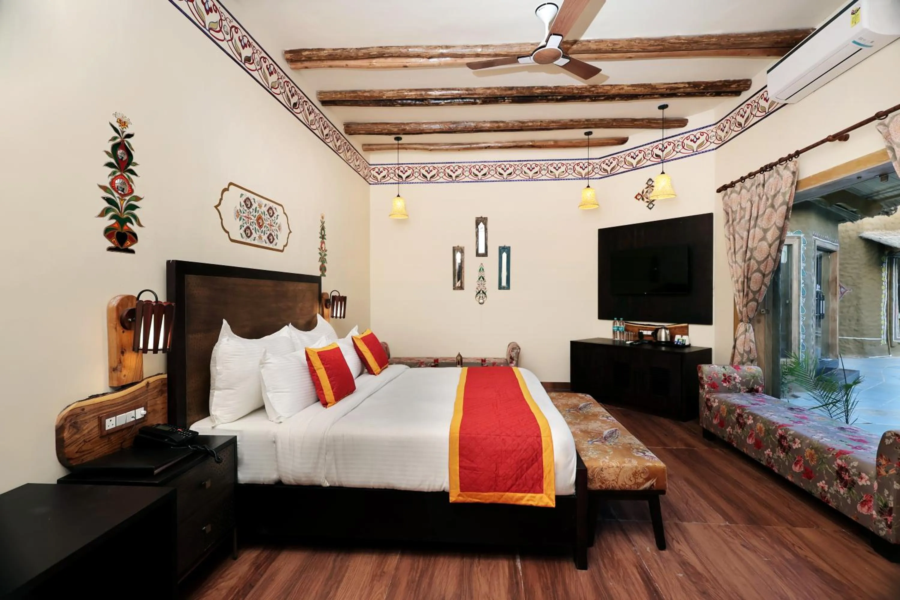 Communal lounge/ TV room, Bed in Nature Village Resort
