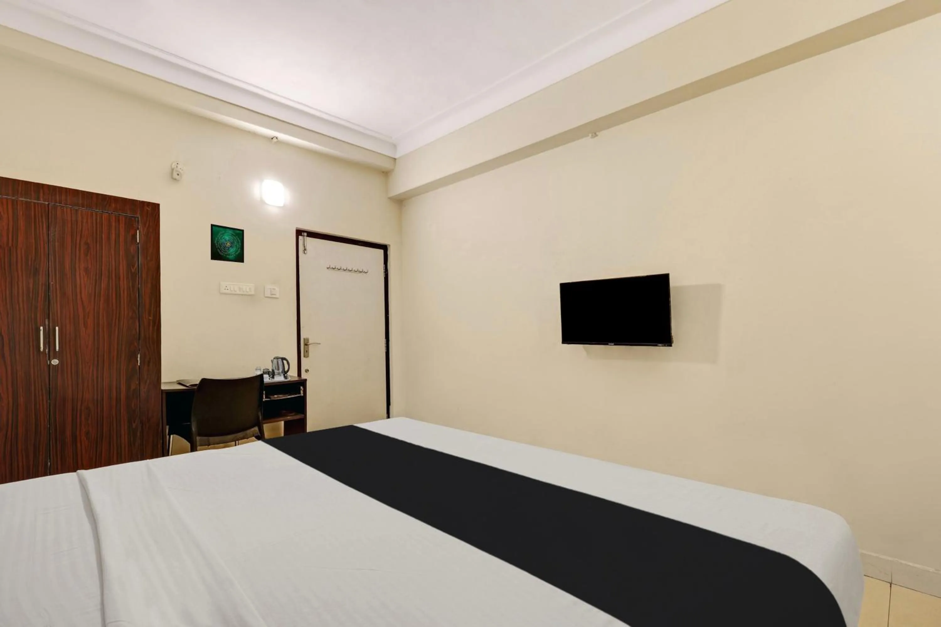 Bedroom, Bed in Super Collection O jagadamba Junction near Beach Road