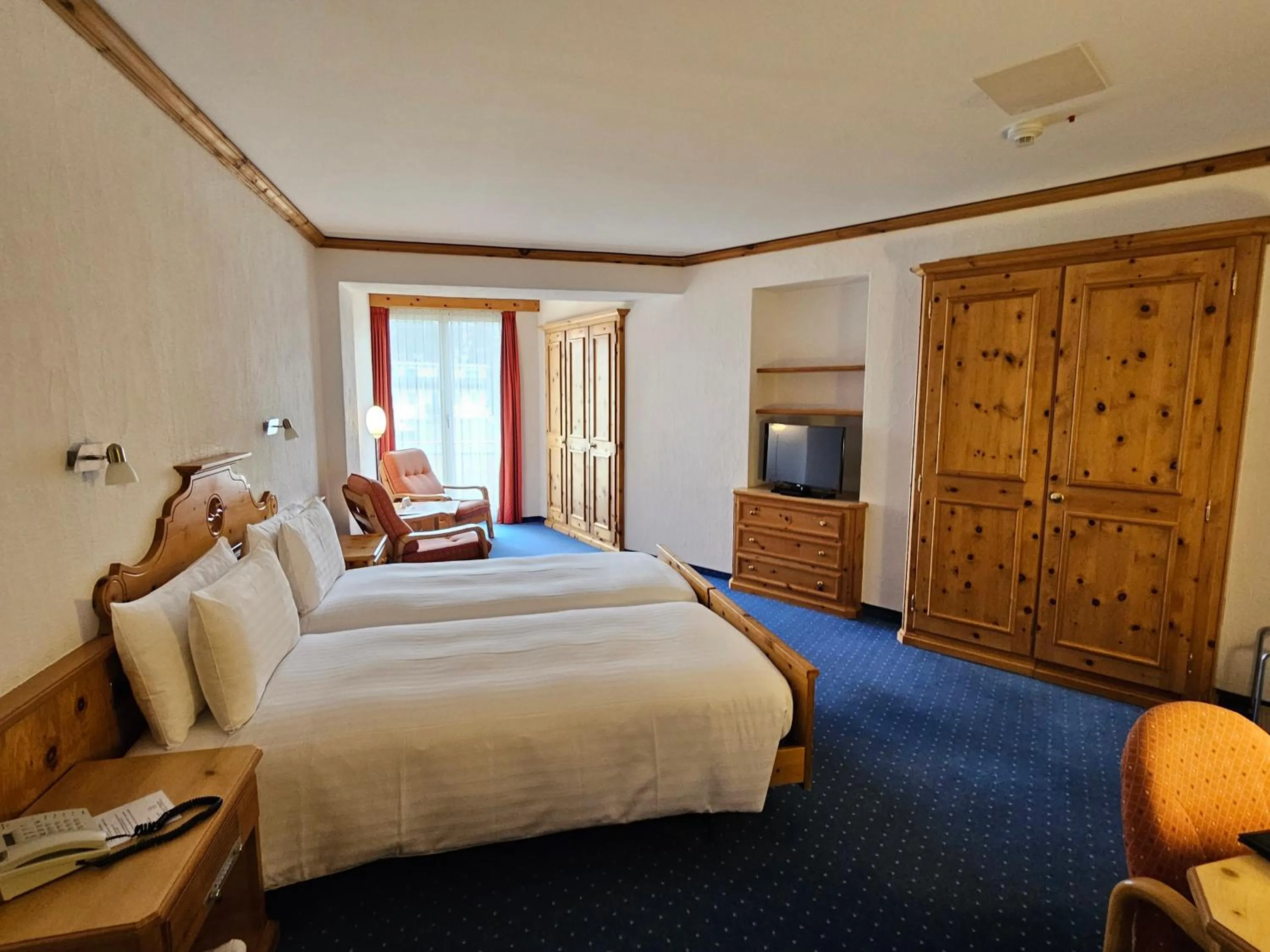 Bed in Hotel Schweizerhof Pontresina