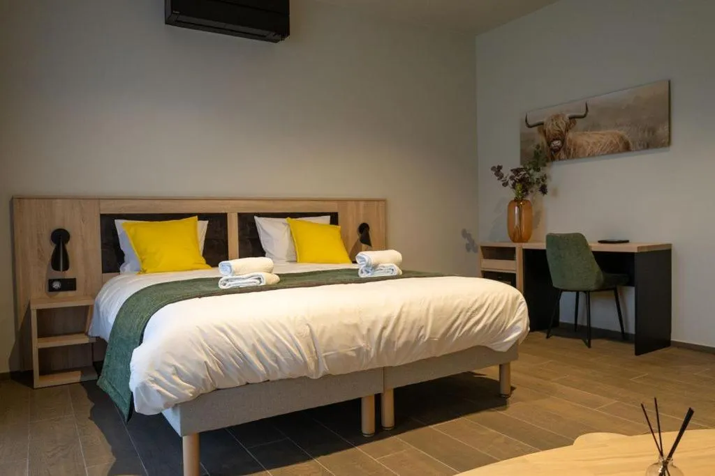 Bed in Les Chambres du Vieux Château