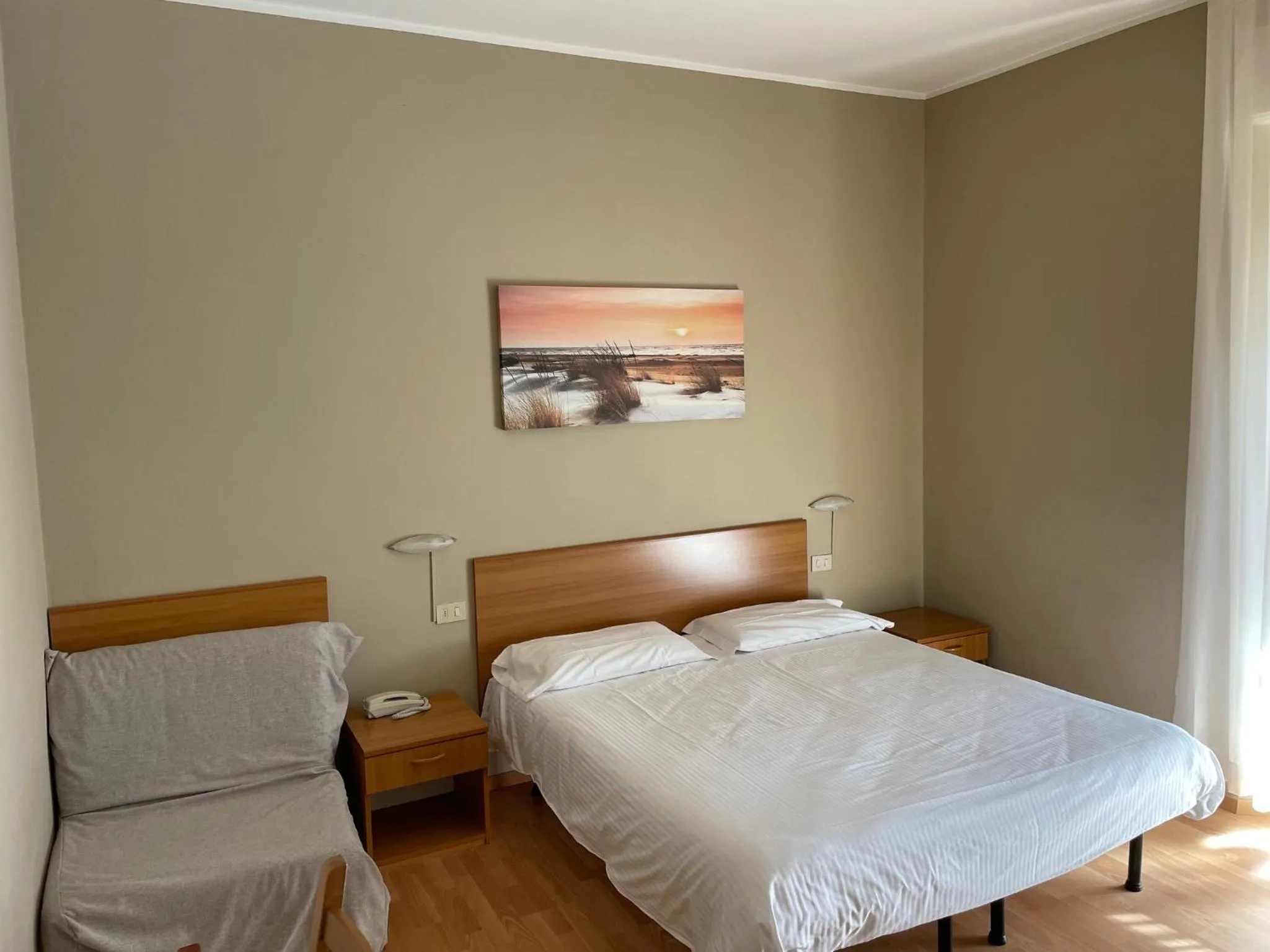 Bed in Piccolo Hotel