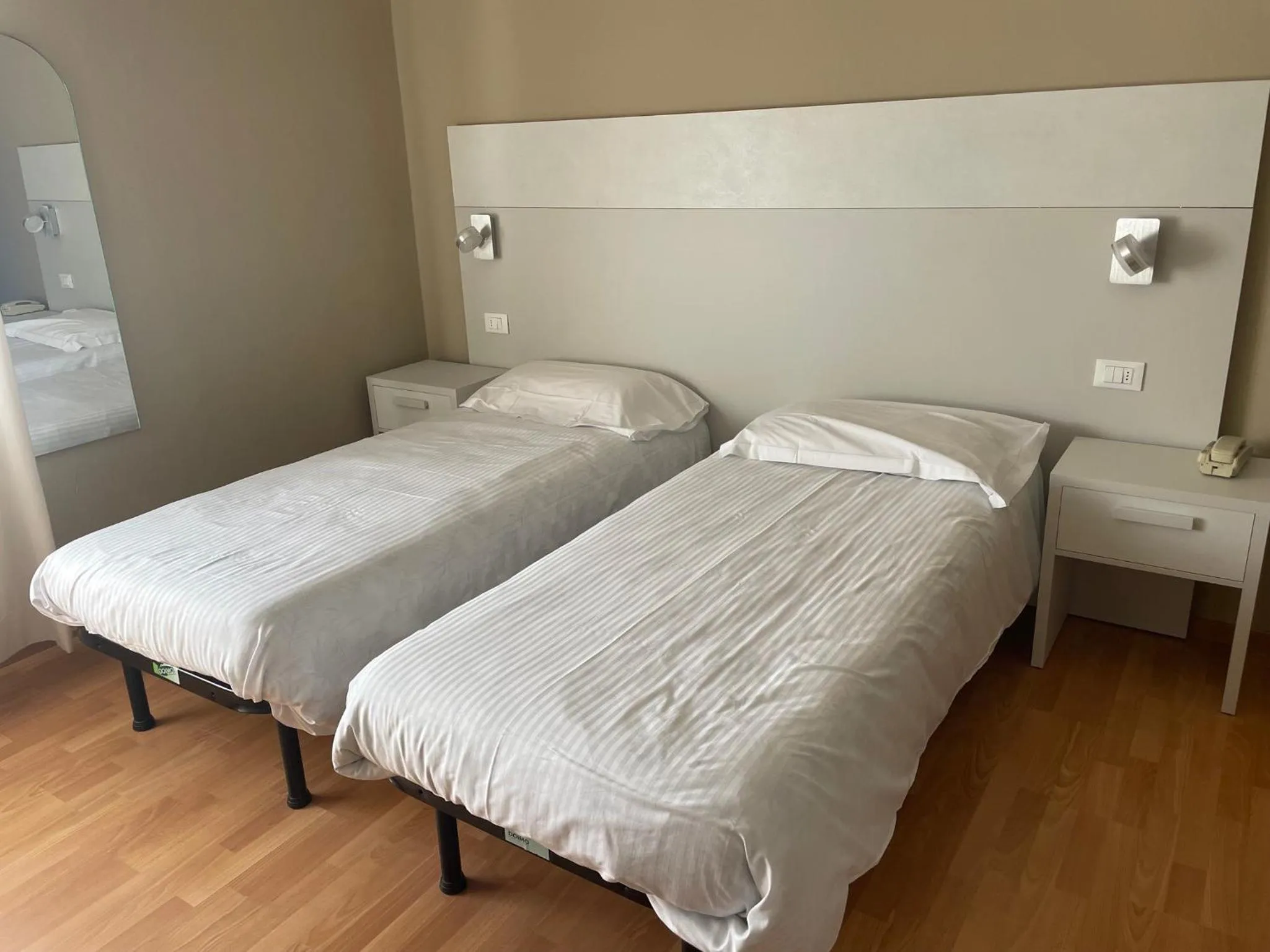 Bed in Piccolo Hotel