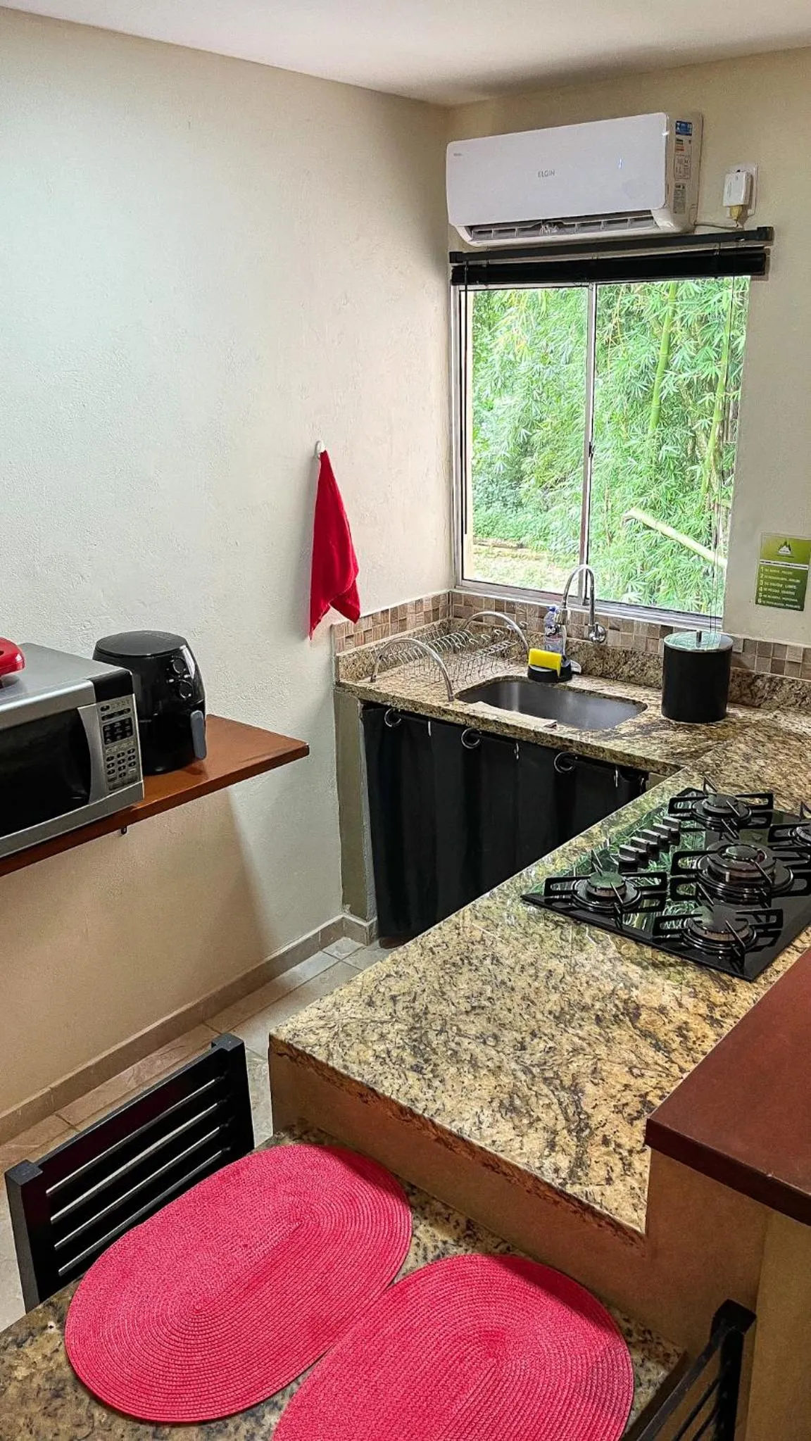 Kitchen or kitchenette in Pousada Entre Folhas