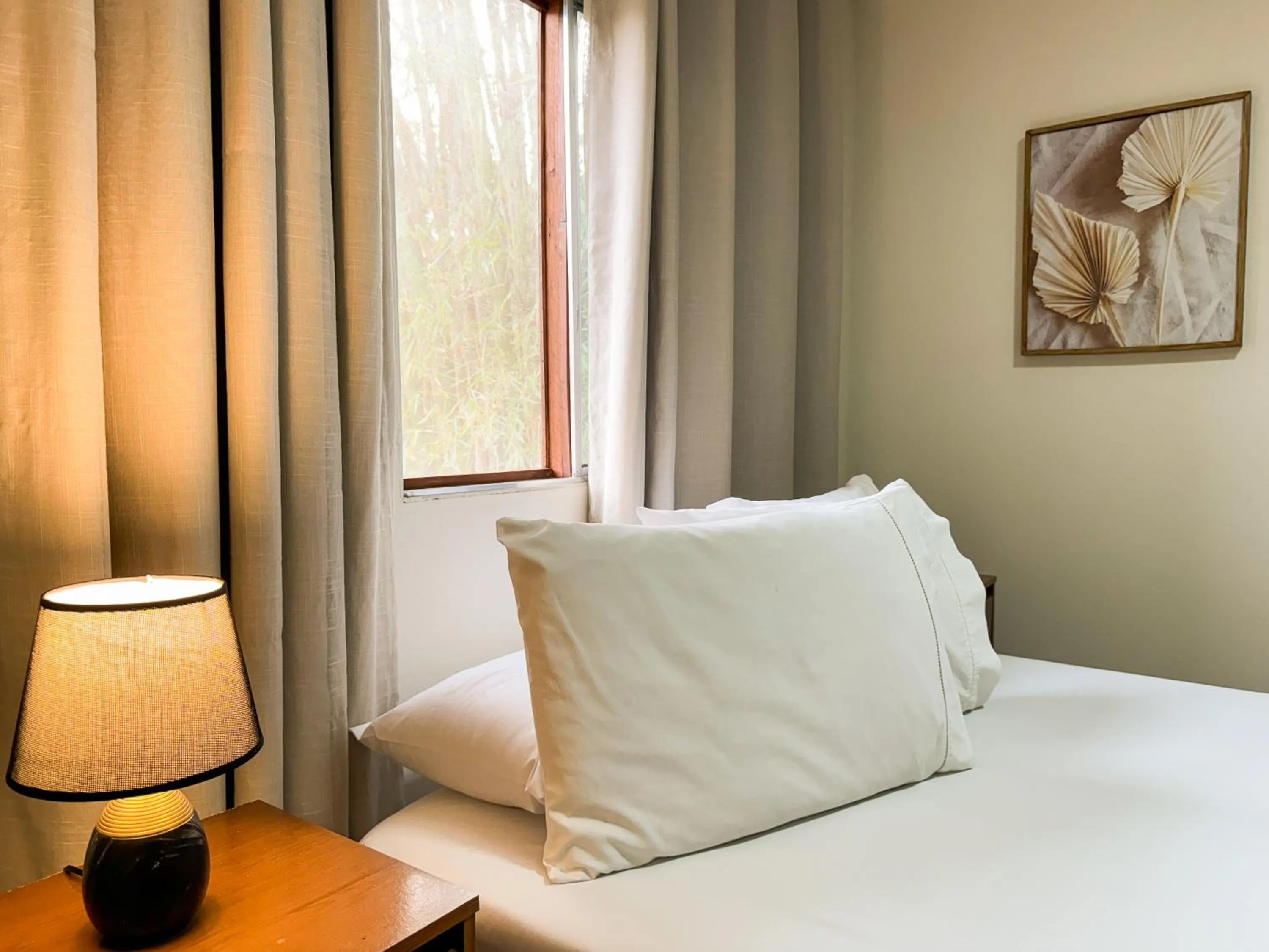 Bed in Pousada Entre Folhas