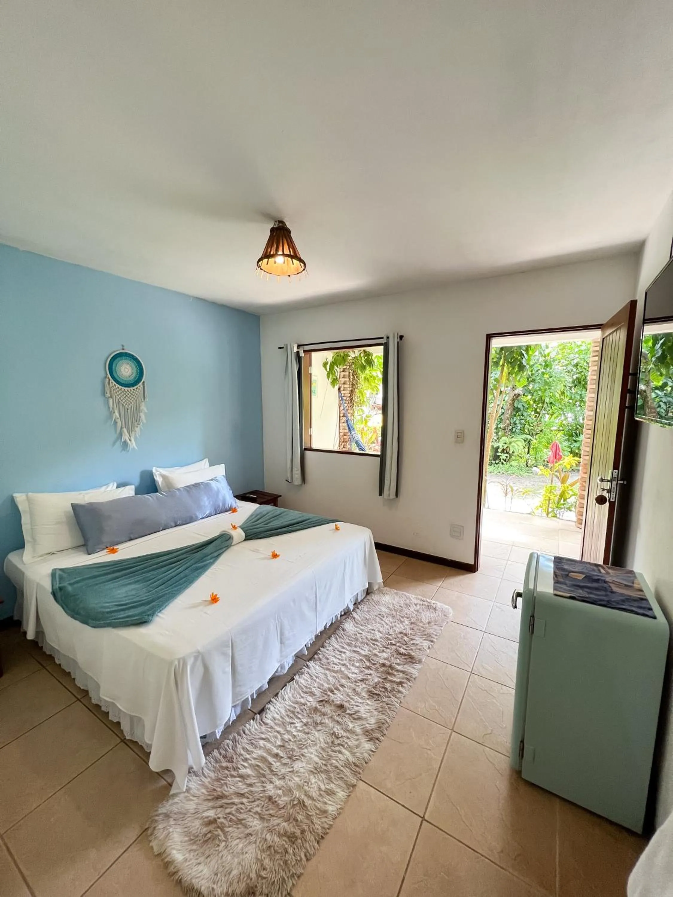 Bed in Chez Max Pousada