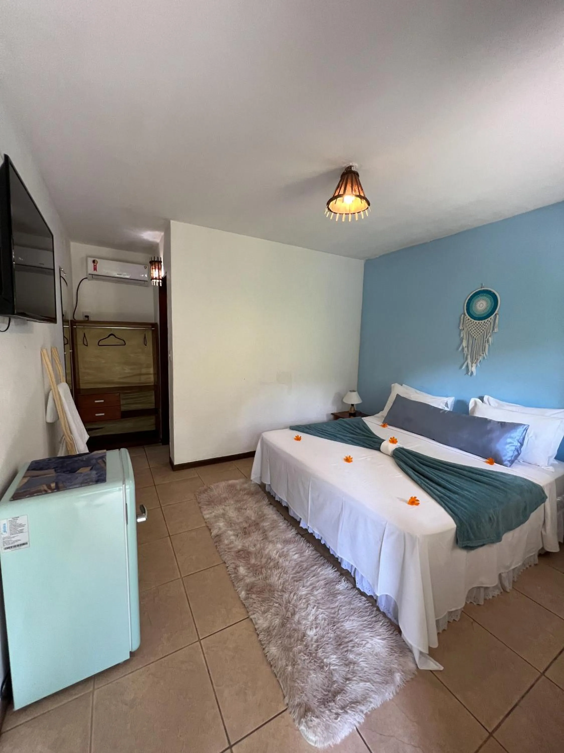 Bed in Chez Max Pousada