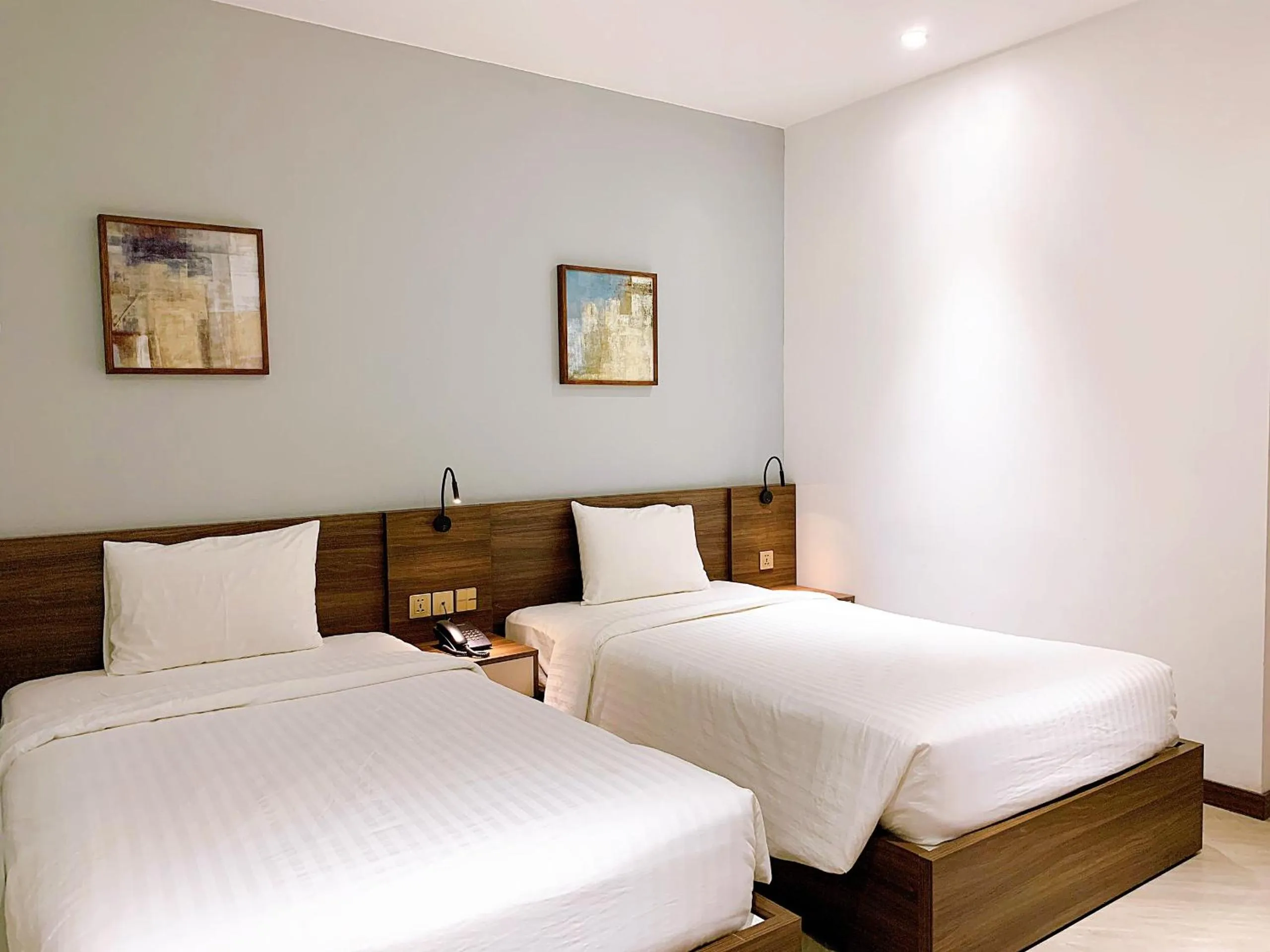 Bed in CHAU KHUONG HOTEL