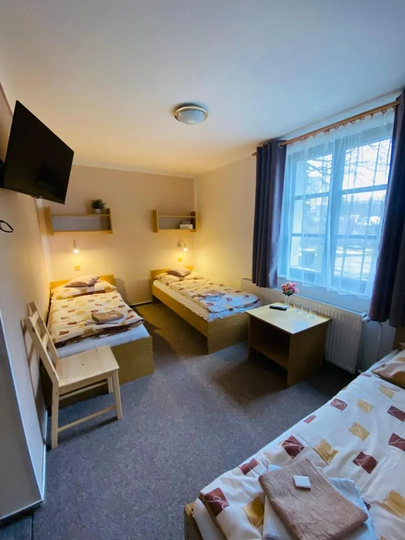 Bed in Hotel Pod Zámkem