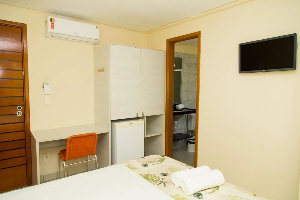 Bed in Pousada Água Viva