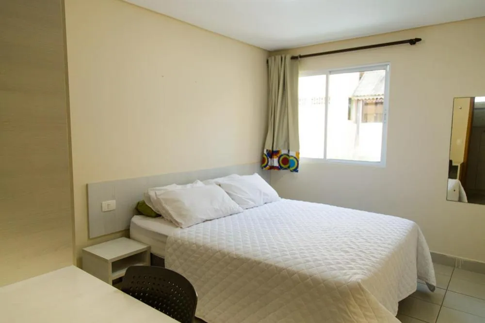 Bed in Pousada Água Viva