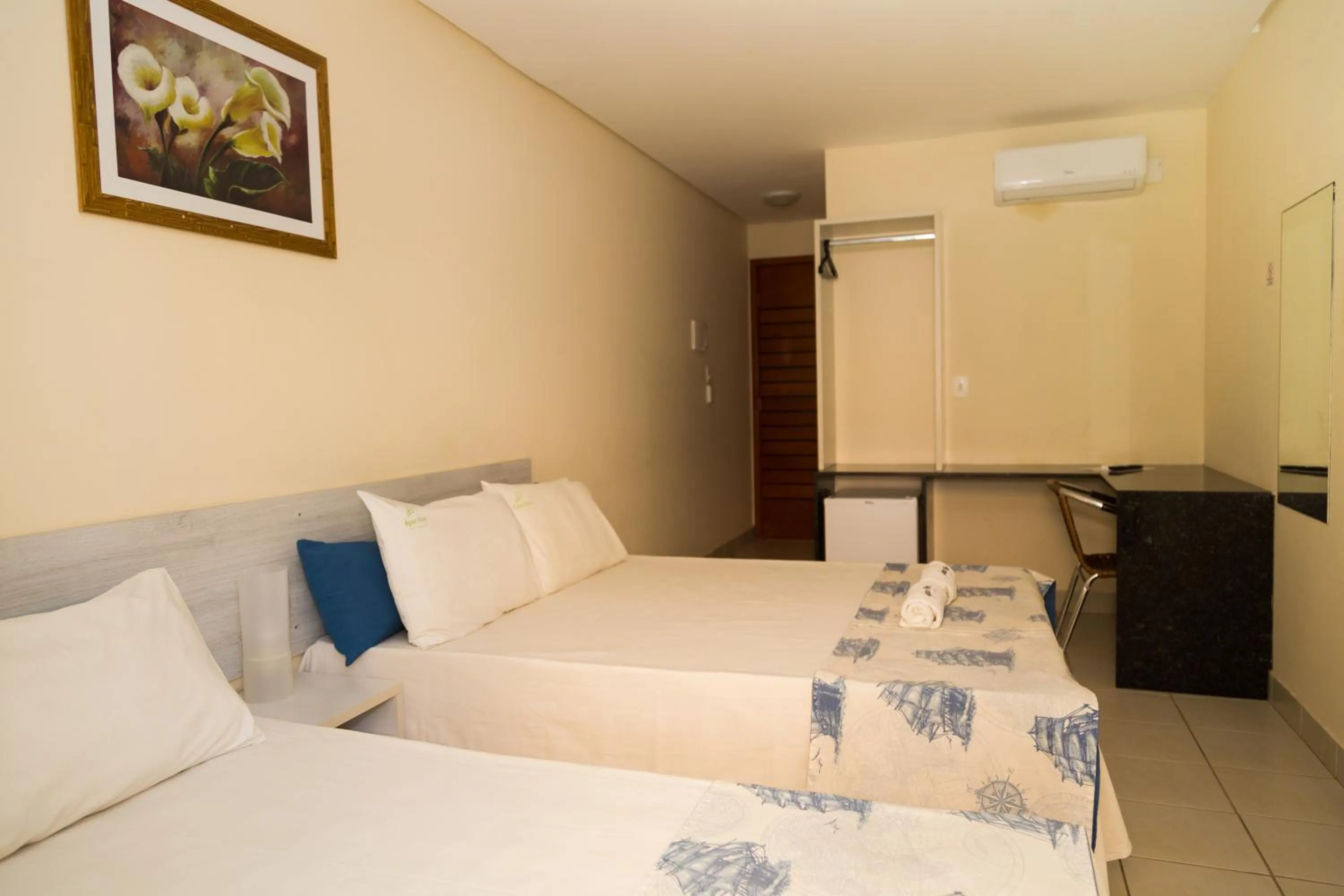 Bed in Pousada Água Viva