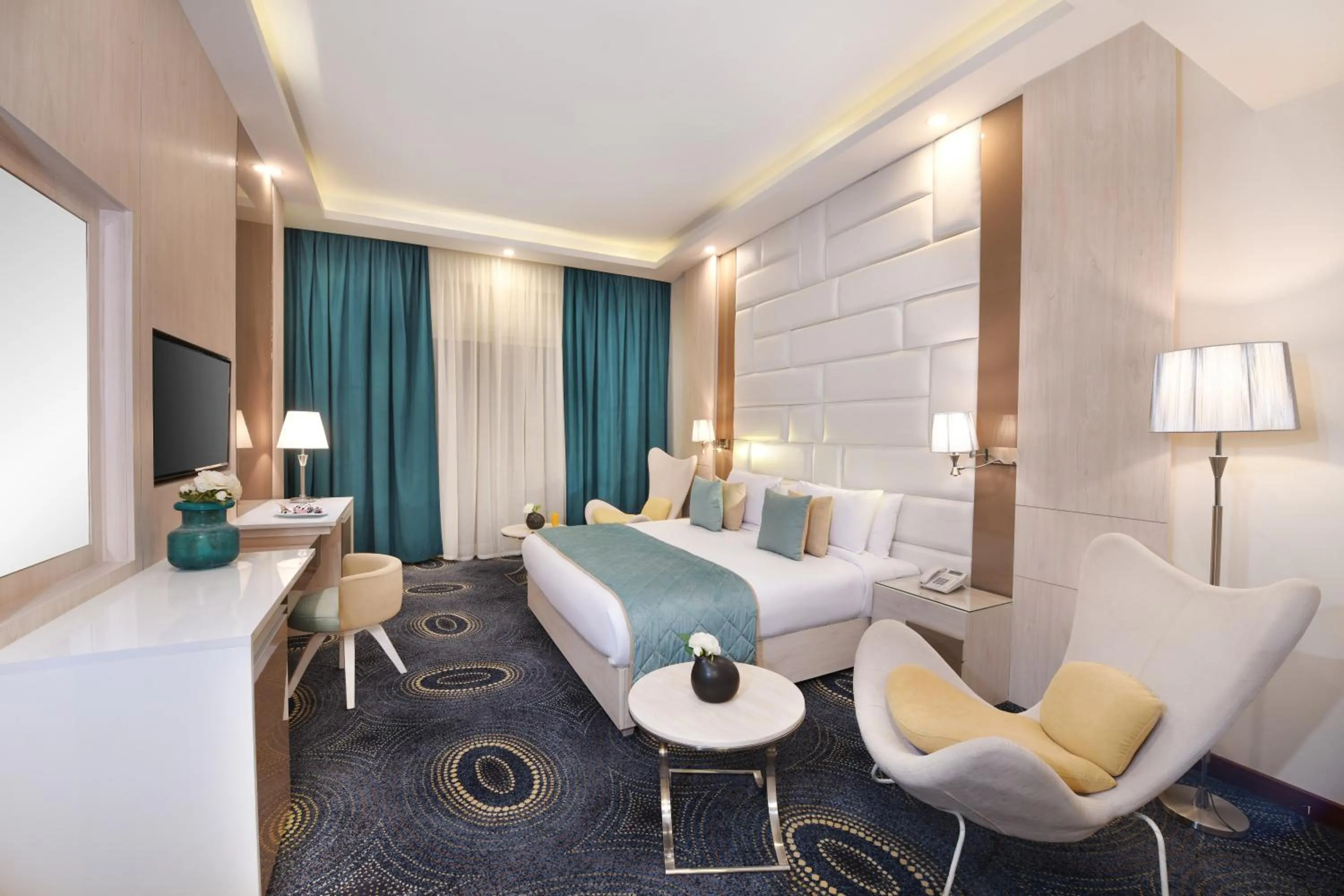 Bedroom in Tolip Gardens Hotel