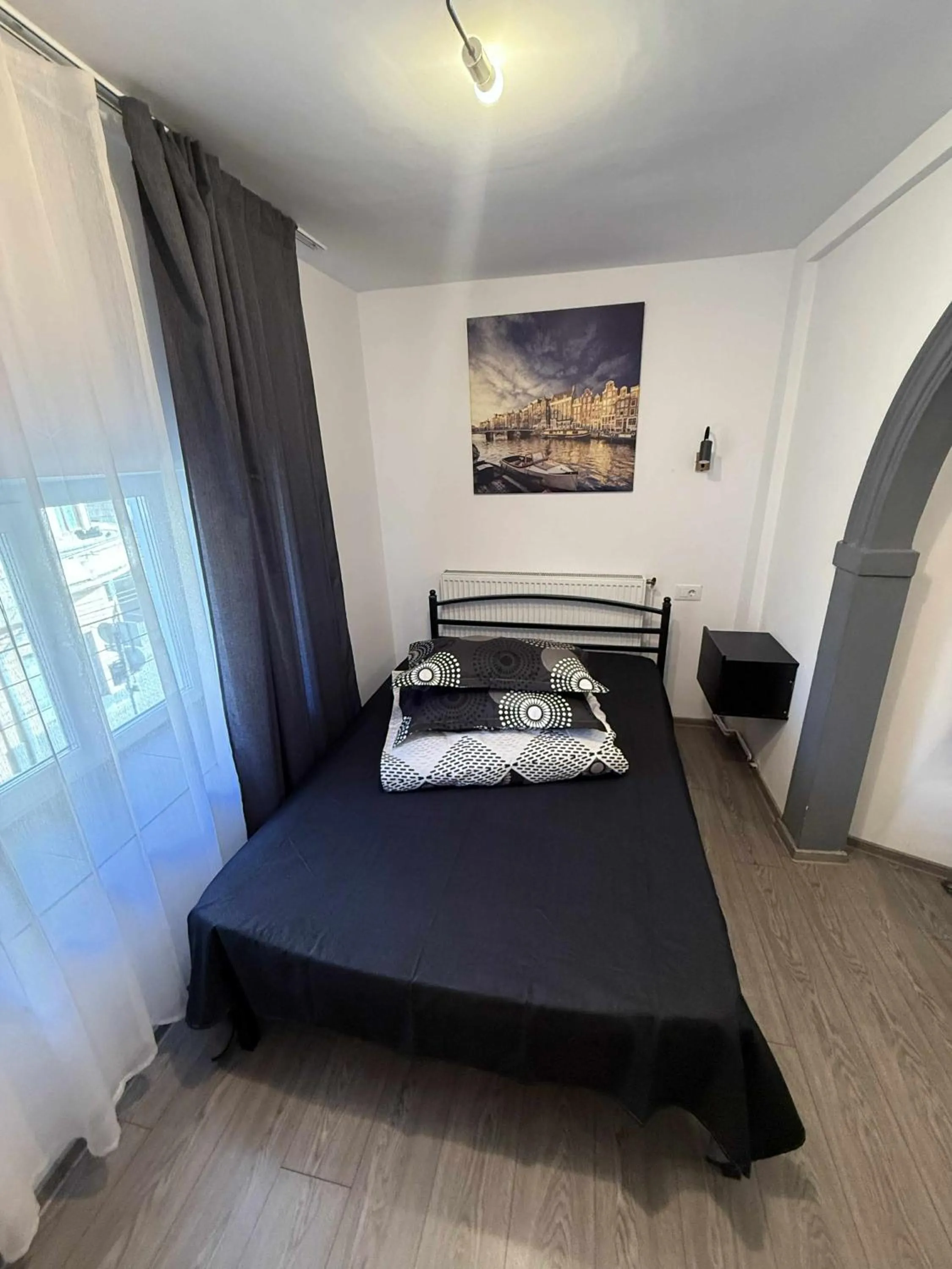 Photo of the whole room, Bed in Casa Bucovineană