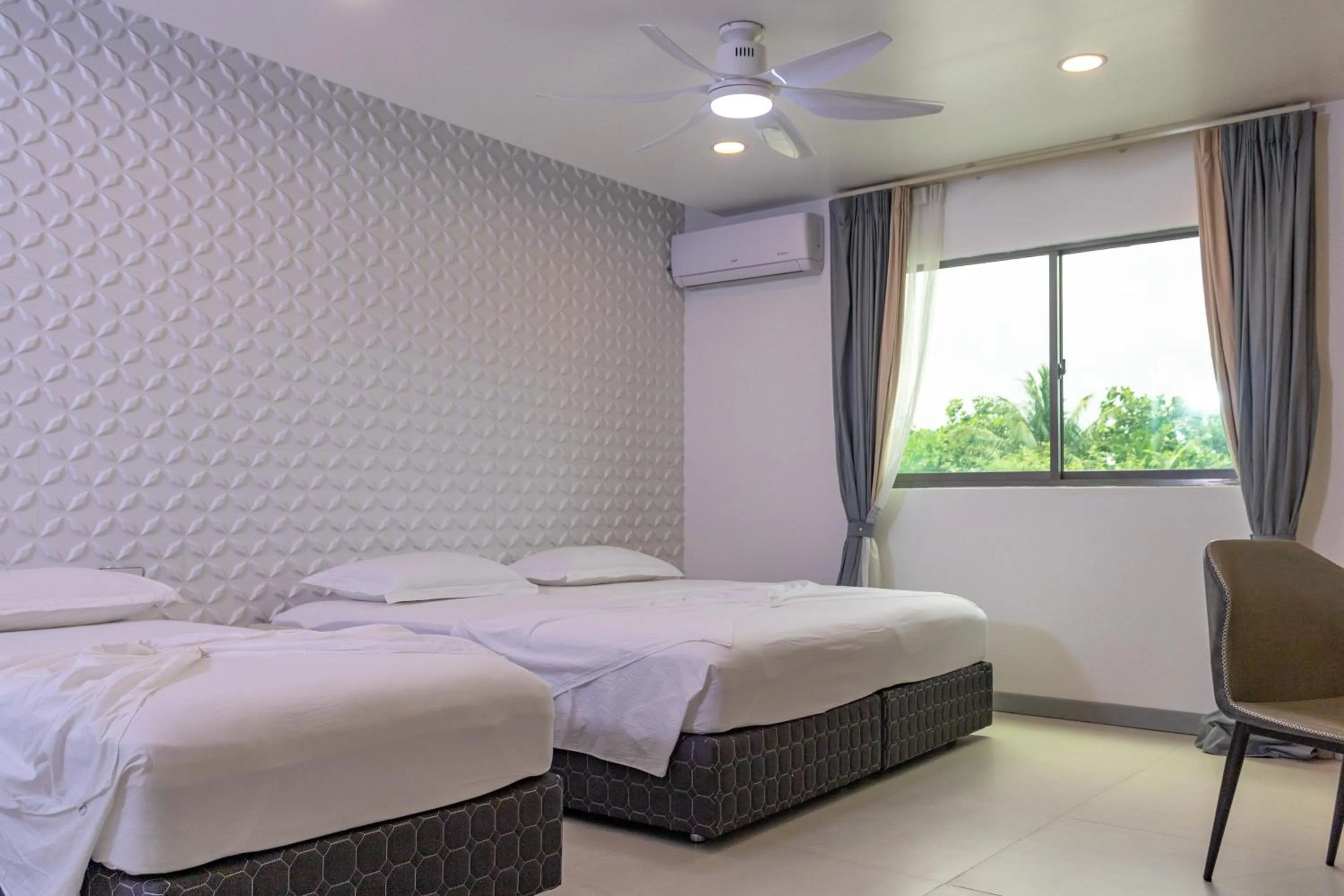 Bed in Wow Inn Keyodhoo