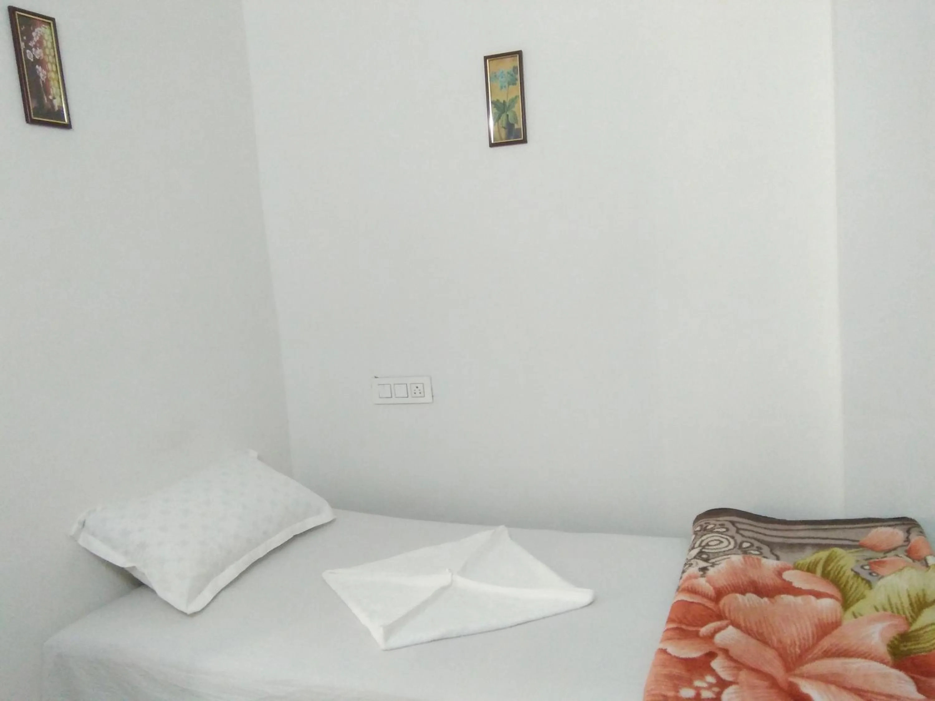 Bed in Sukun Guest House