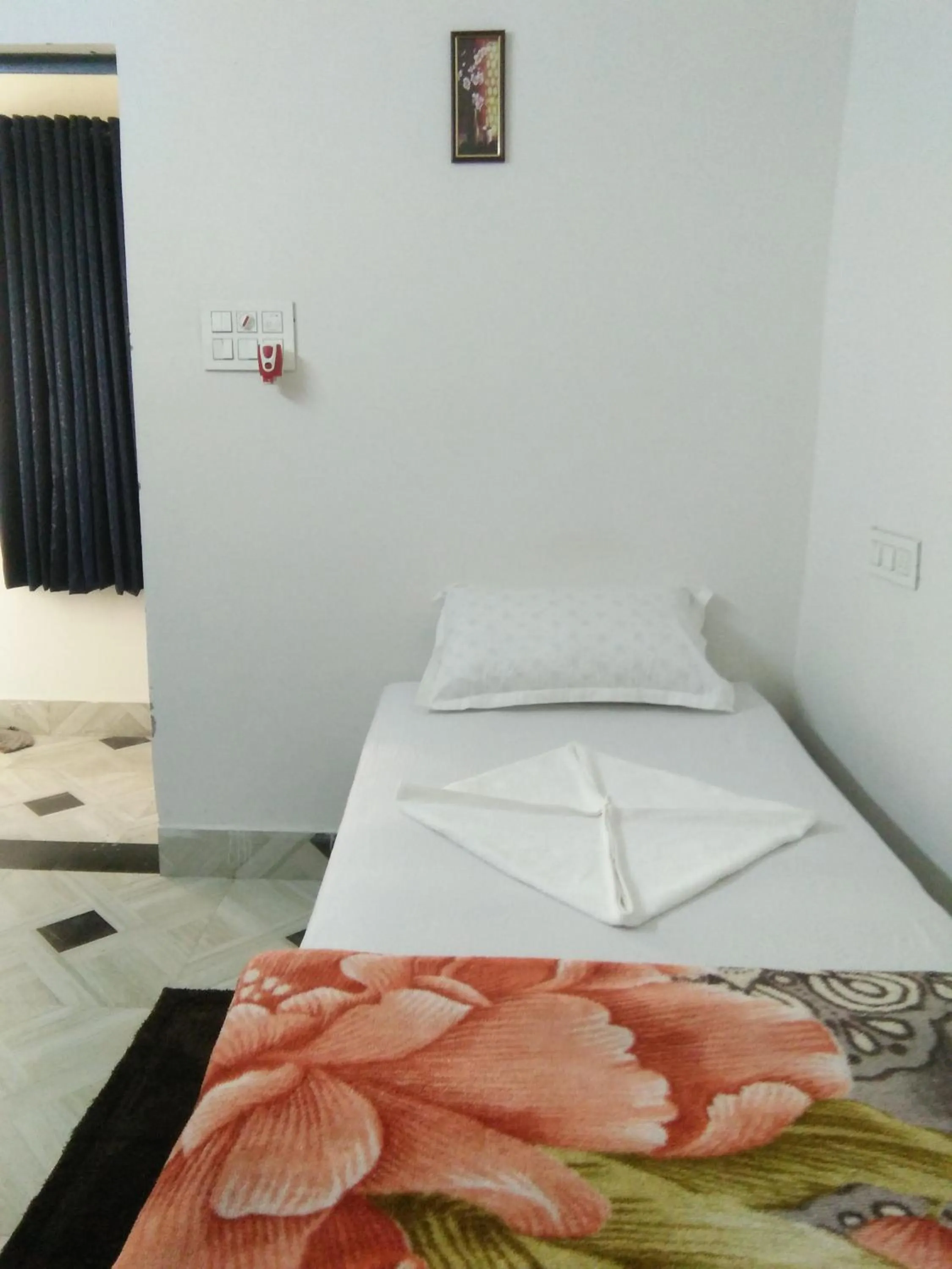 Bed in Sukun Guest House