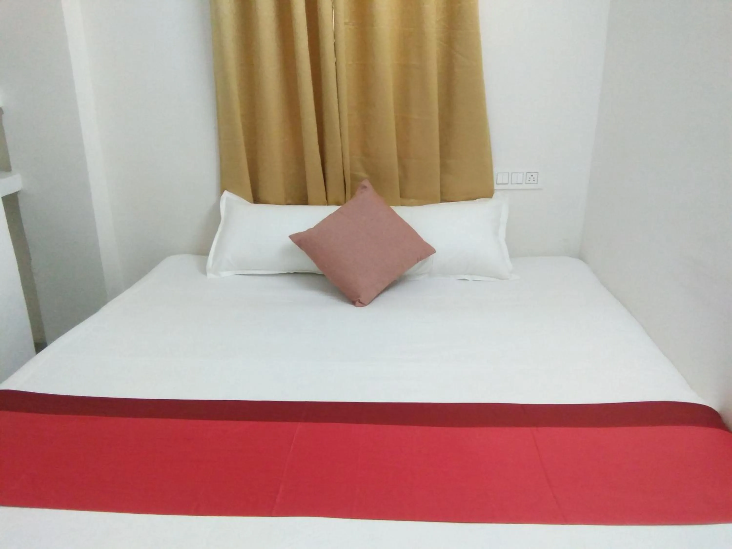 Bed in Sukun Guest House