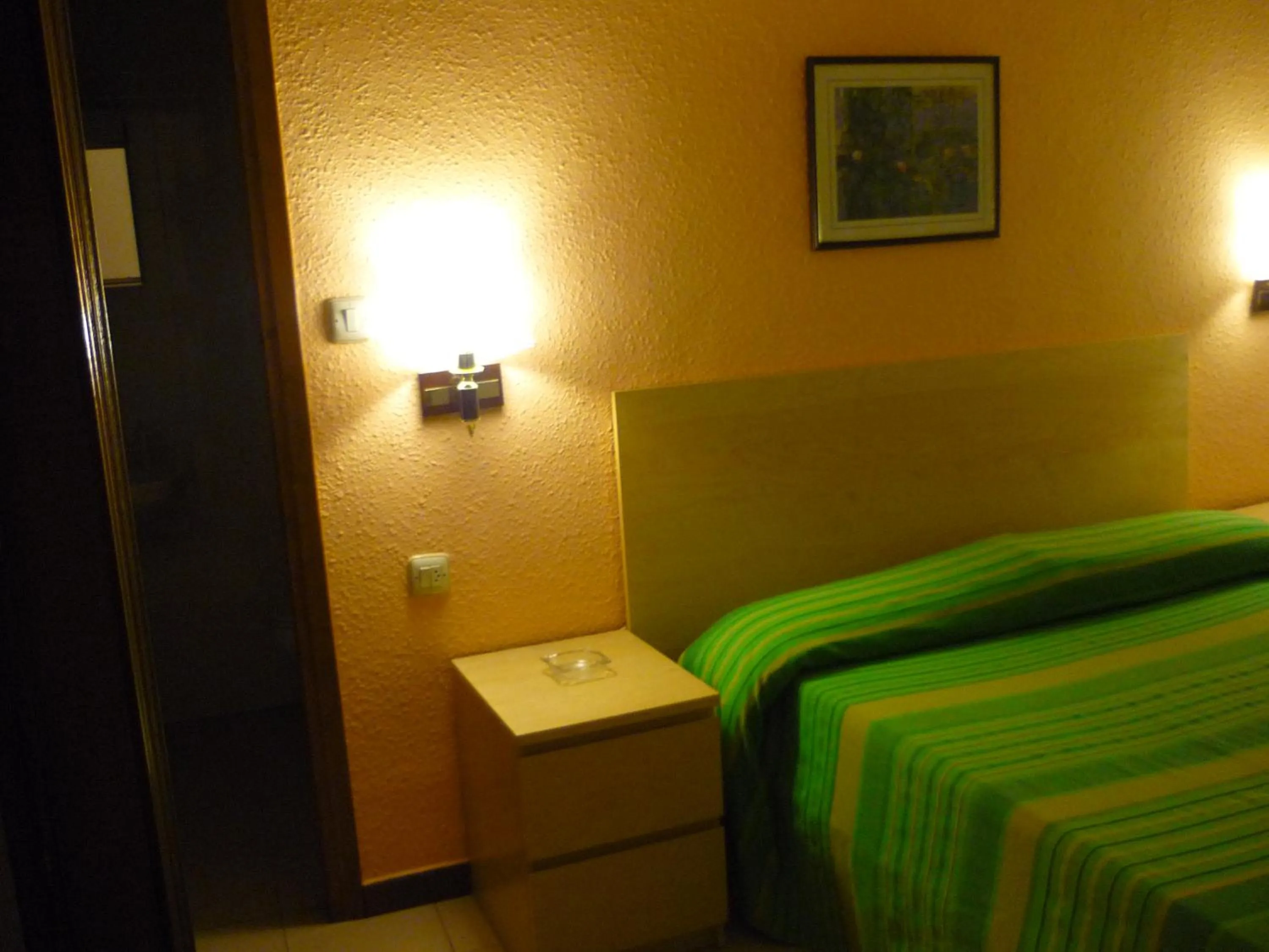 Bed in Hostal El Centro