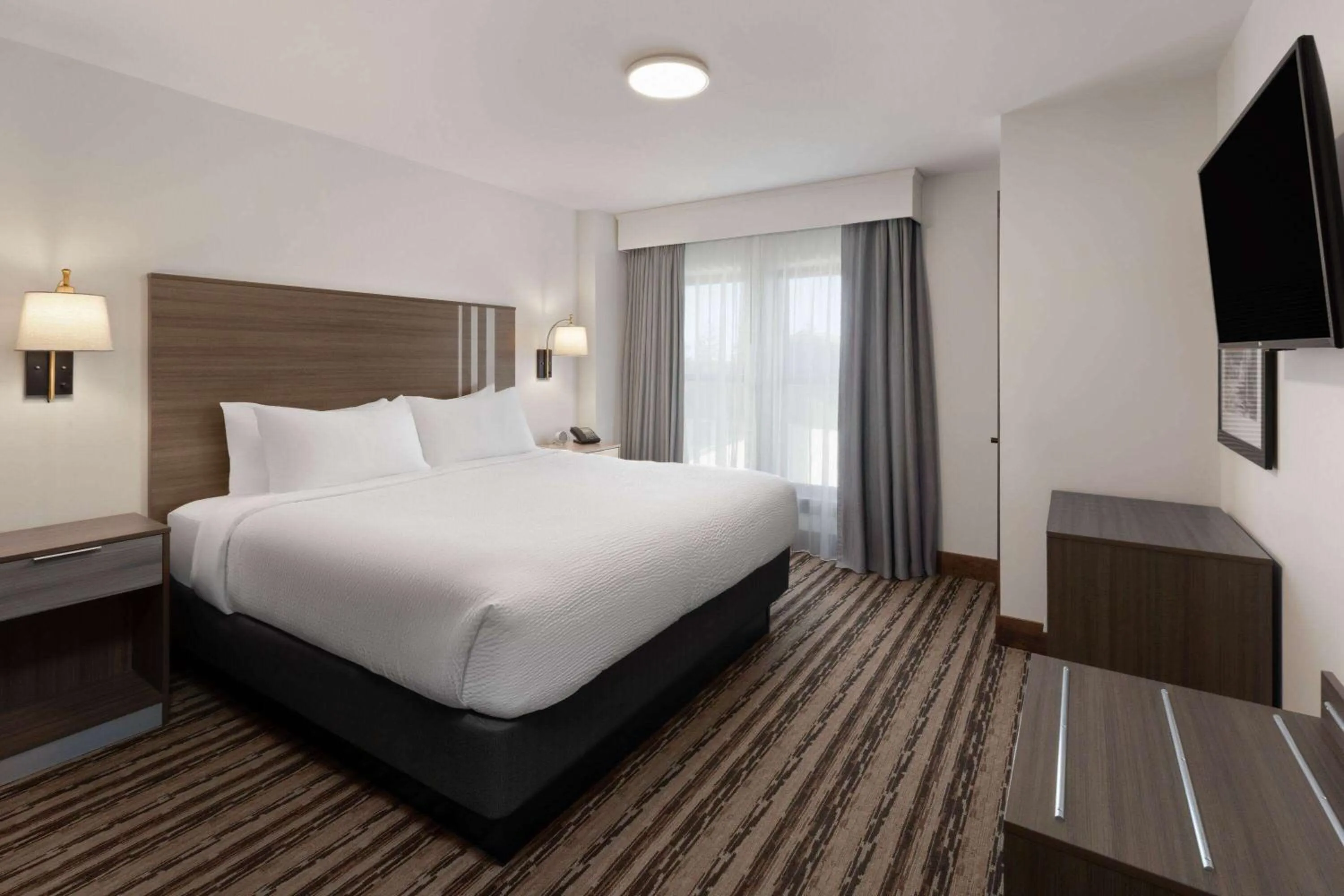 Photo of the whole room, Bed in Corduroy Inn and Lodge, Trademark Collection by Wyndham