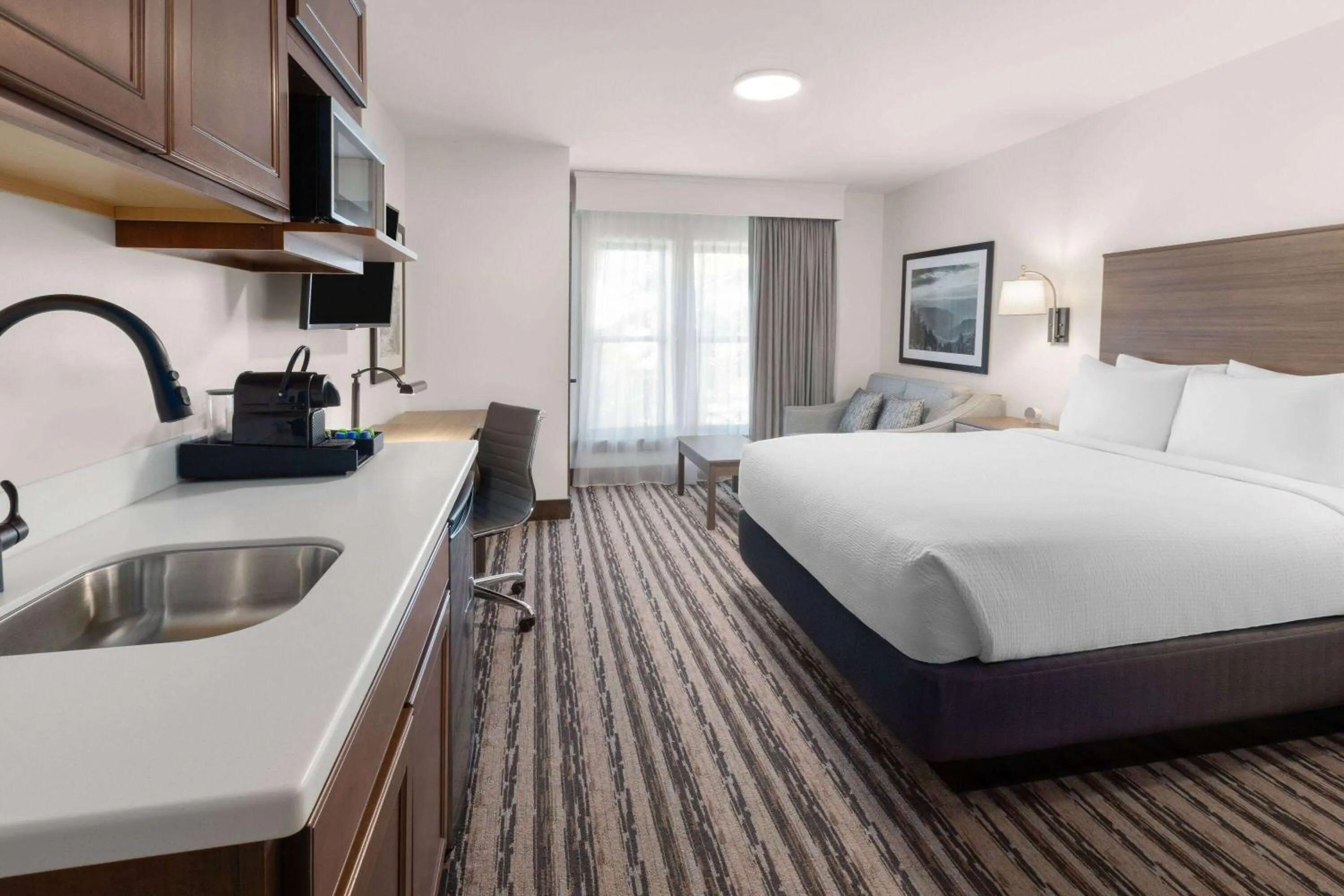 Photo of the whole room, Bed in Corduroy Inn and Lodge, Trademark Collection by Wyndham