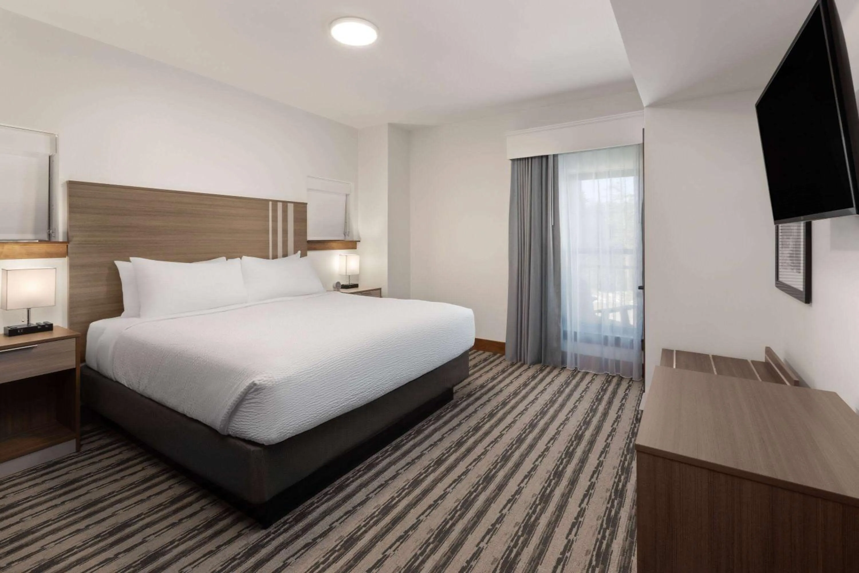 Photo of the whole room, Bed in Corduroy Inn and Lodge, Trademark Collection by Wyndham