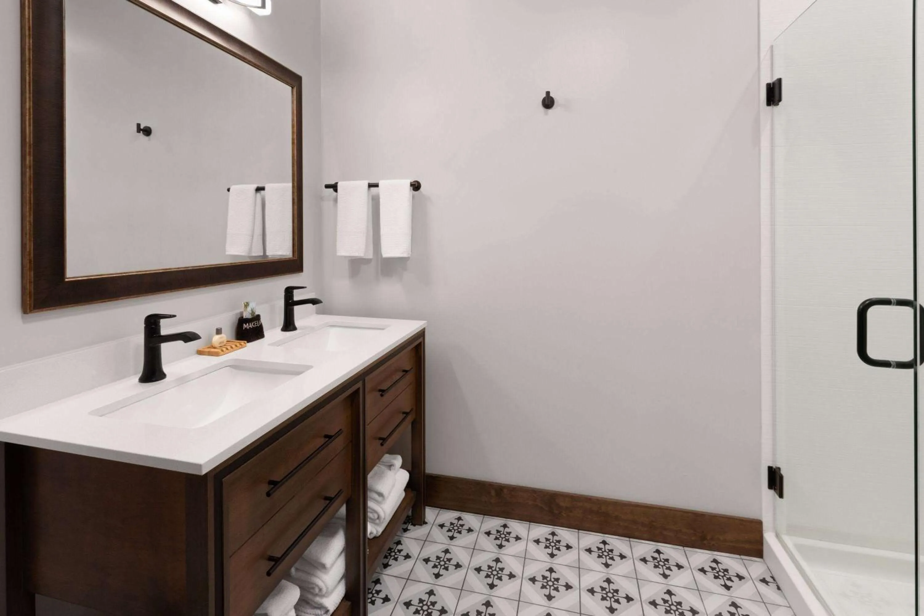 Bathroom in Corduroy Inn and Lodge, Trademark Collection by Wyndham