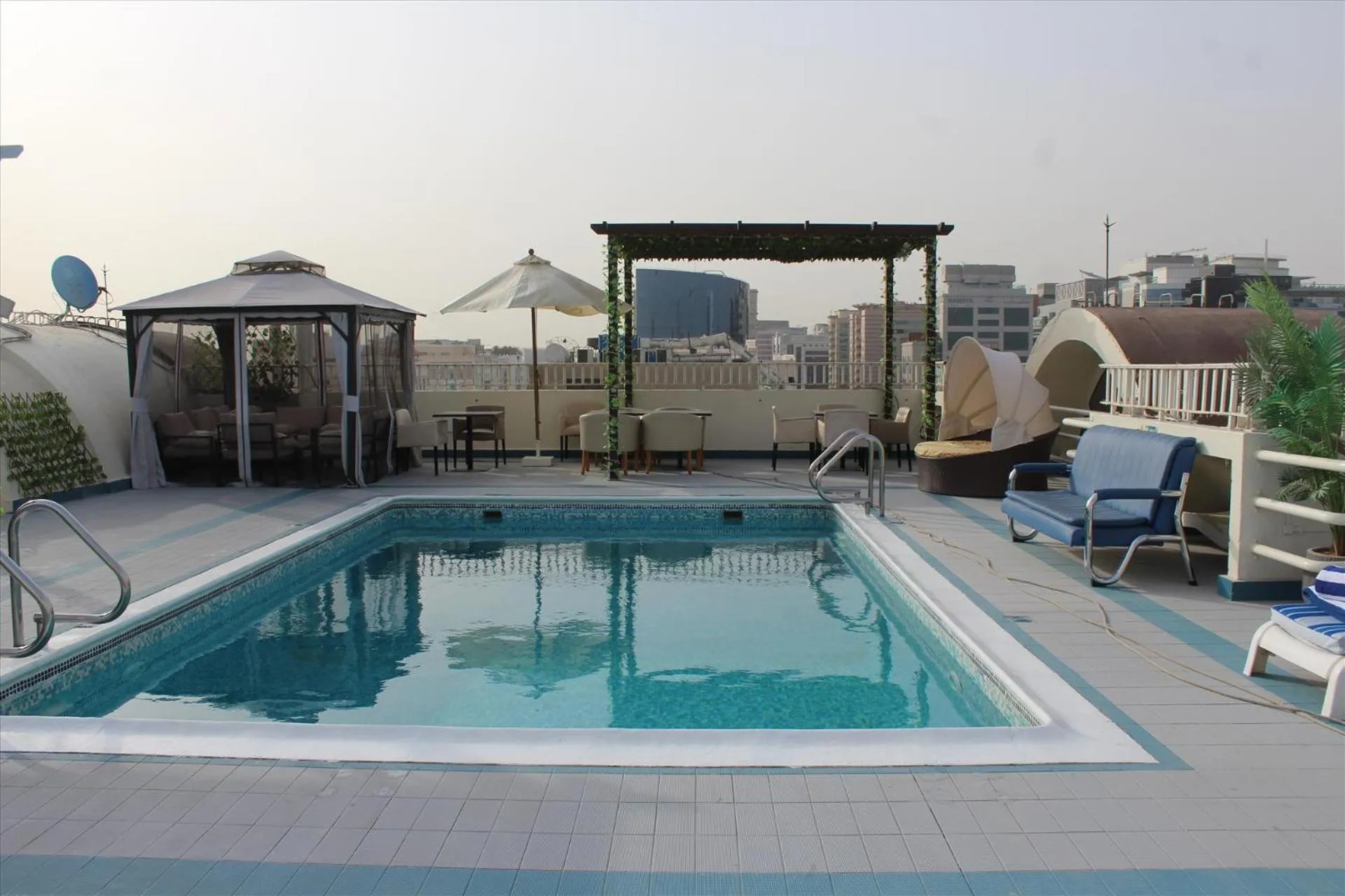 Swimming pool in Al Khaleej Palace Deira Hotel